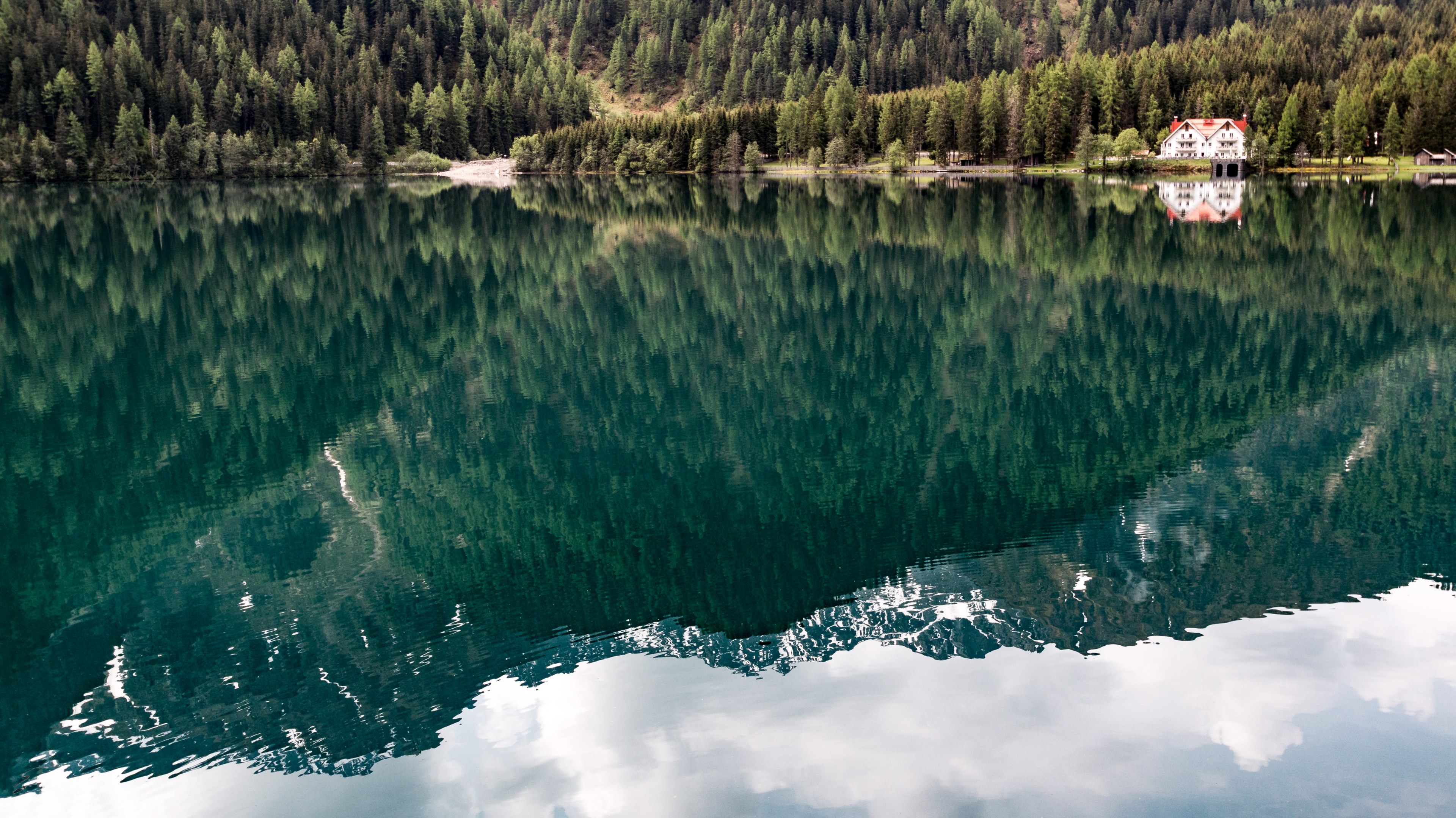 mountains reflected in an emerald green surface of a lake, mountains over a green lake 4k, HD Wallpaper