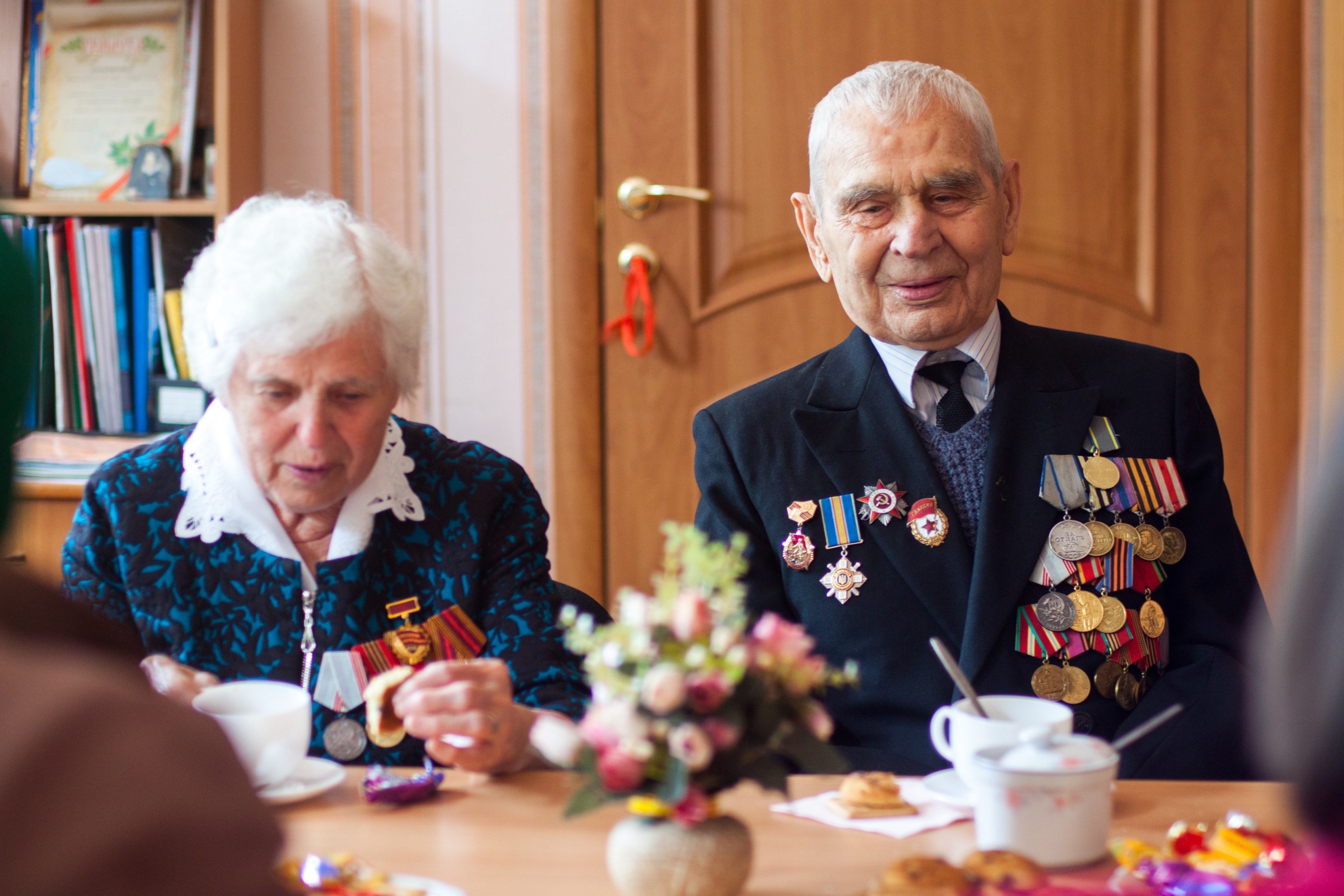 a retired and old ukraine soldier sitting with his wife and medals on his jacket, _retired ukraine soldier 4k, HD Wallpaper