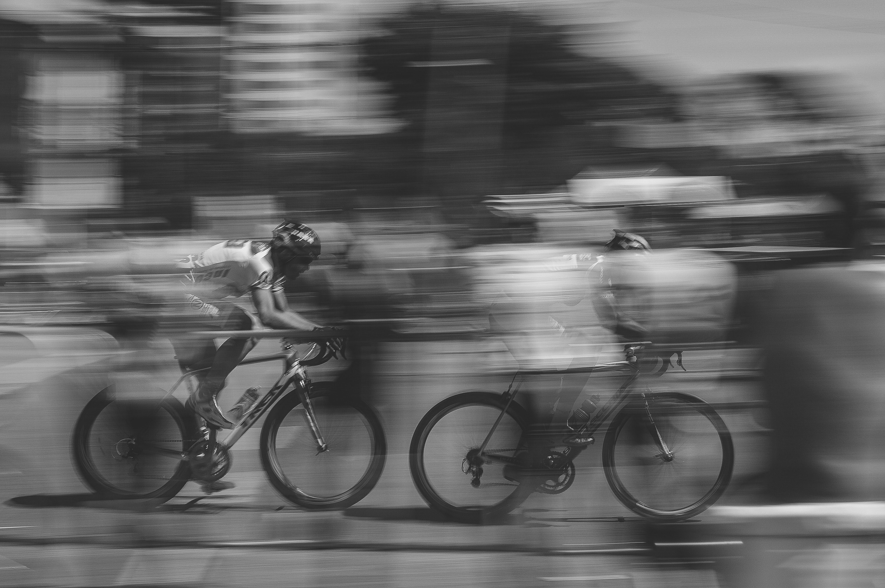 a blurry shot of cyclists biking through curitiba in brazil, cyclists in brazil 4k, HD Wallpaper