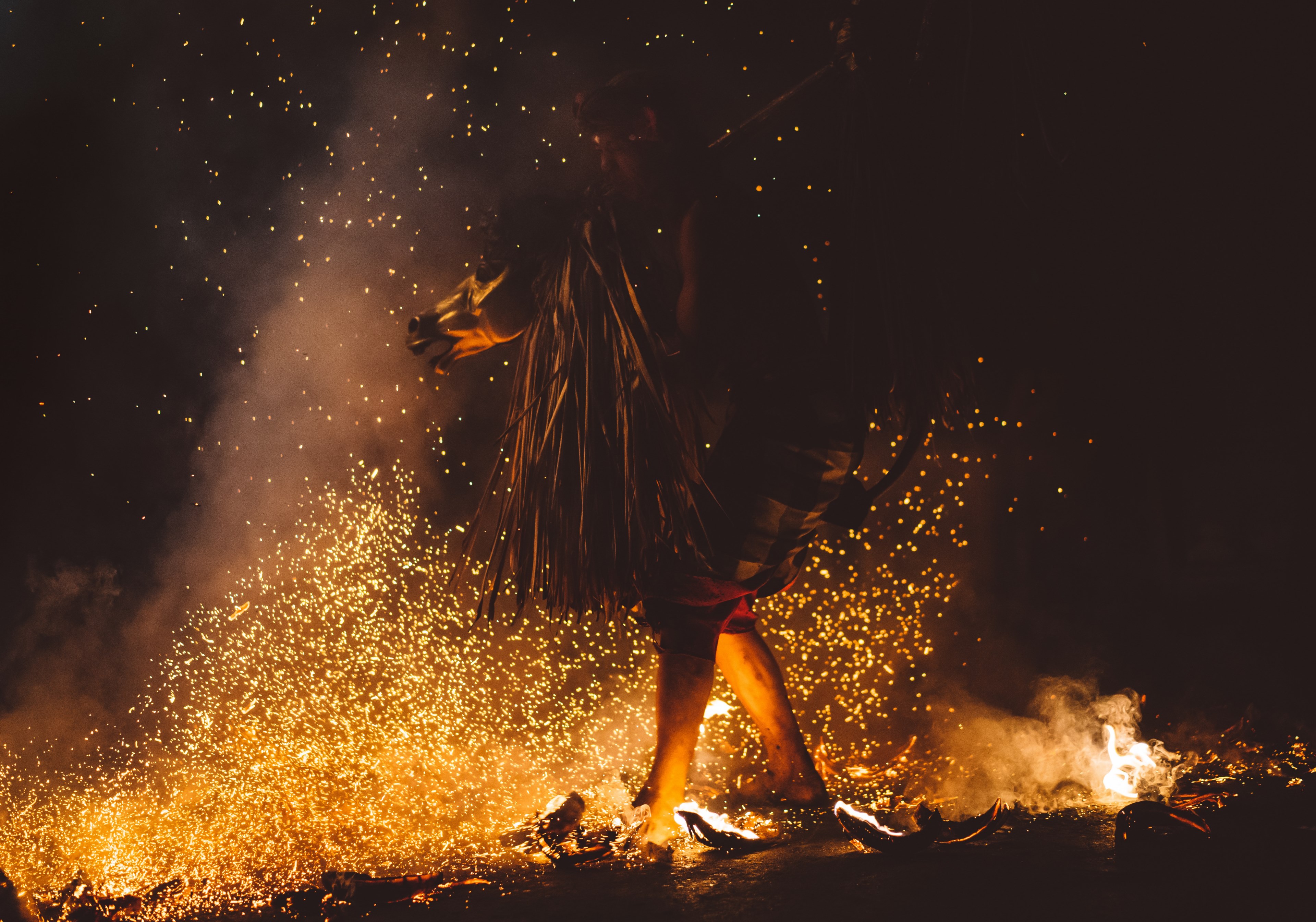 a man walking on fire with his feets burning and sparks every where in ubud, sanghyang djaran 4k, HD Wallpaper