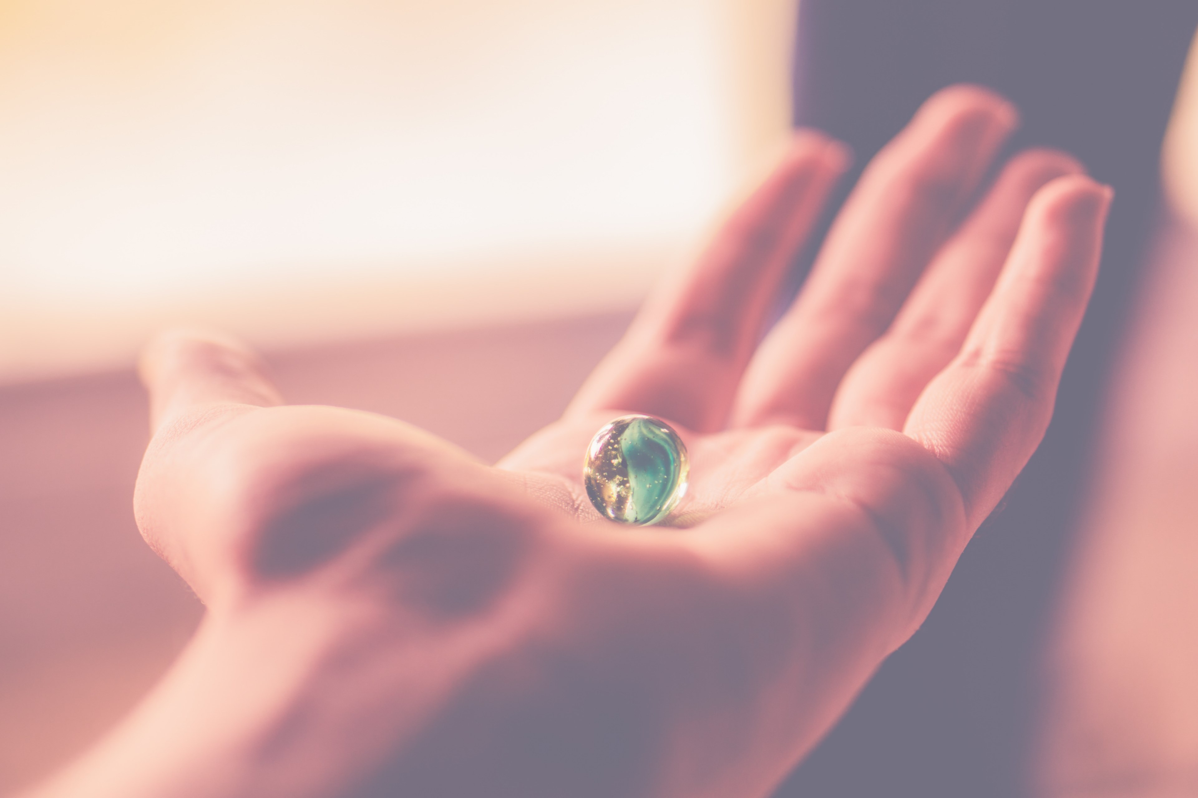a glass marble on a persons open hand, glass marble in hand 4k, HD Wallpaper