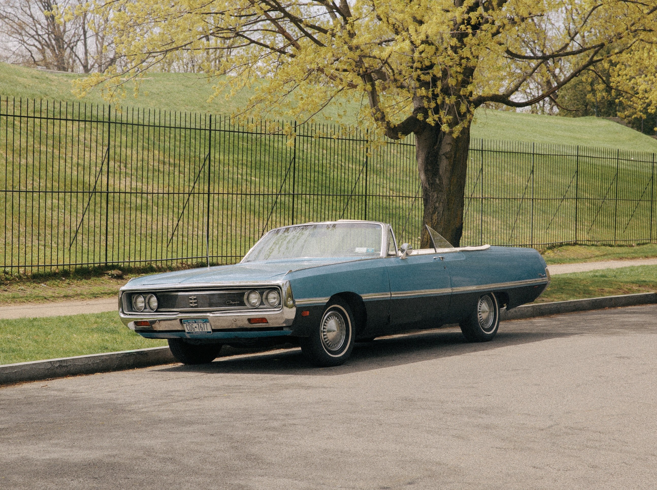 a blue vintage convertible parked next to a hill, _car 4k, HD Wallpaper
