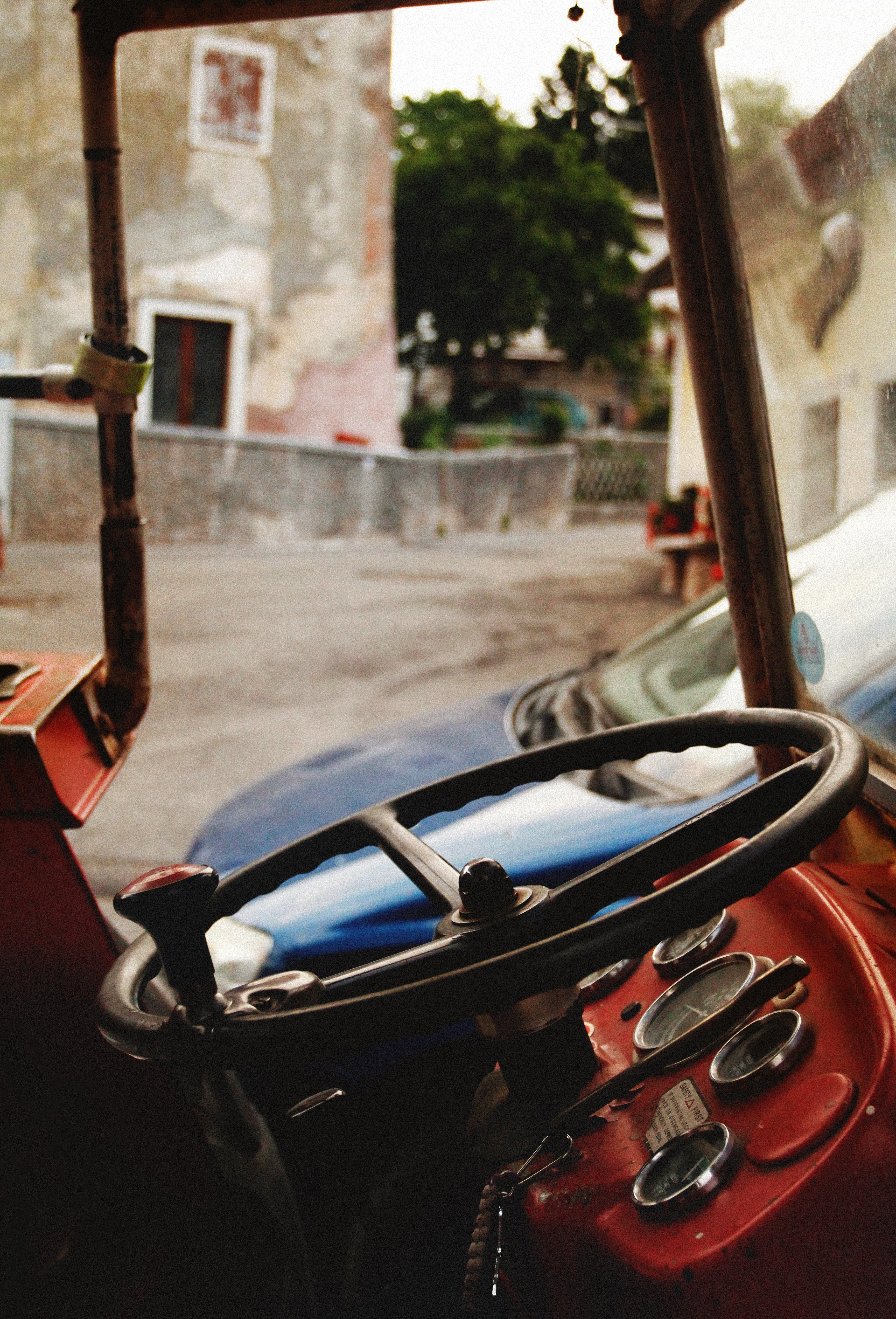 the steering wheel and inside of a tractor in breonio, tractor 4k, Phone HD Wallpaper