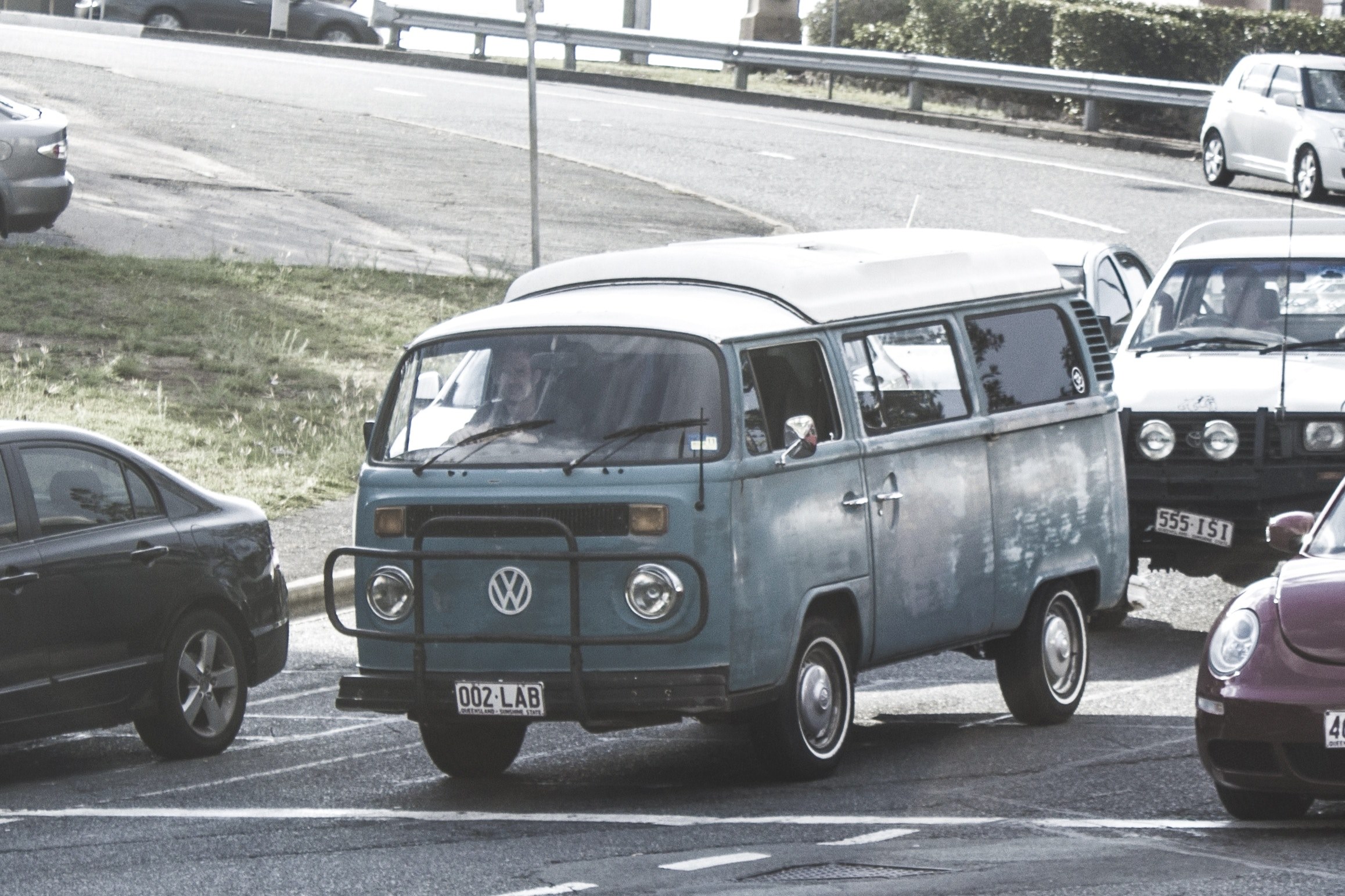 vintage green volkswagen camper driving in daytime traffic on road, vintage green volkswagen camper on road 4k, HD Wallpaper