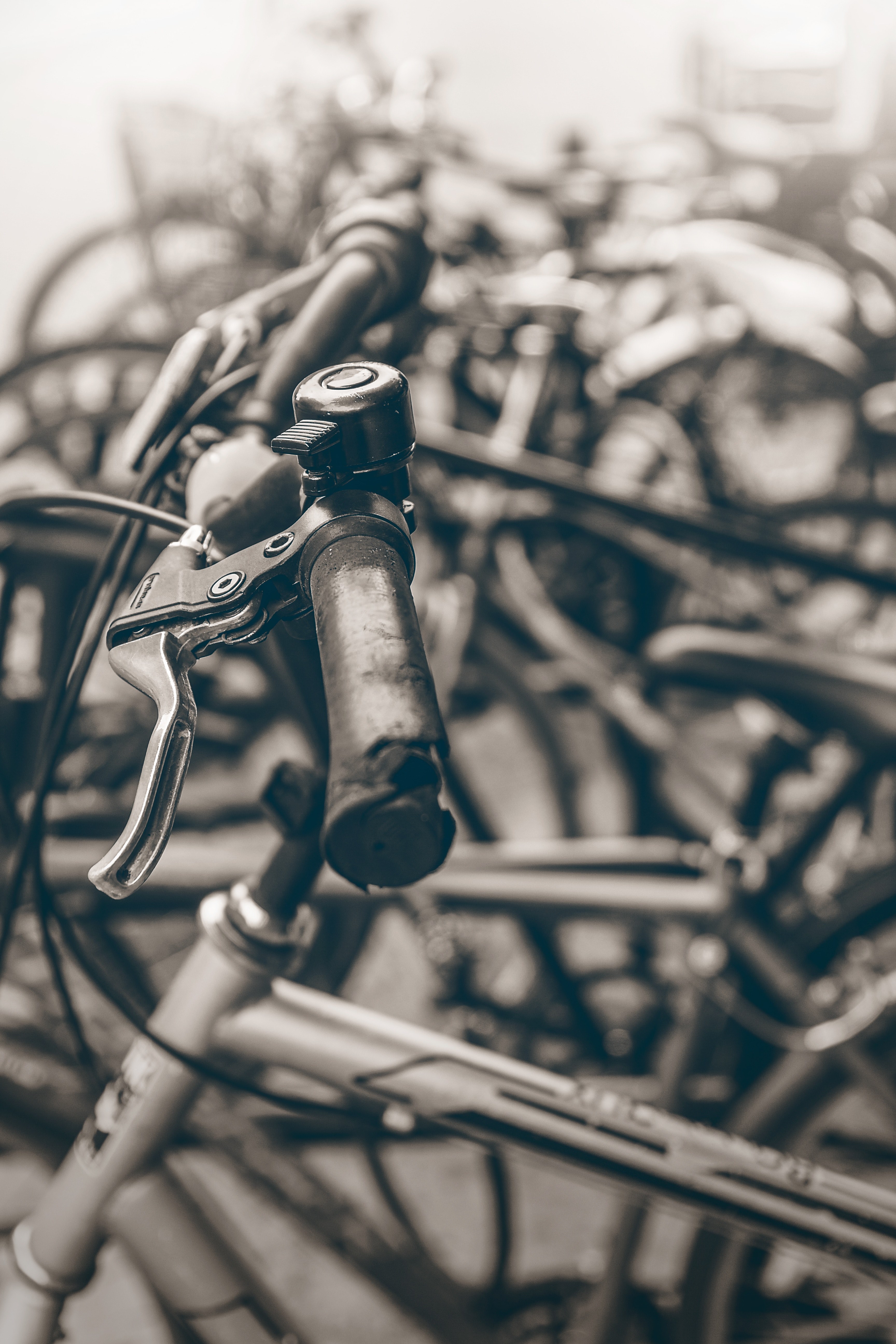 black and white close up of bike handlebars and bell in cambridge, bike close up in cambridge 4k, Phone HD Wallpaper