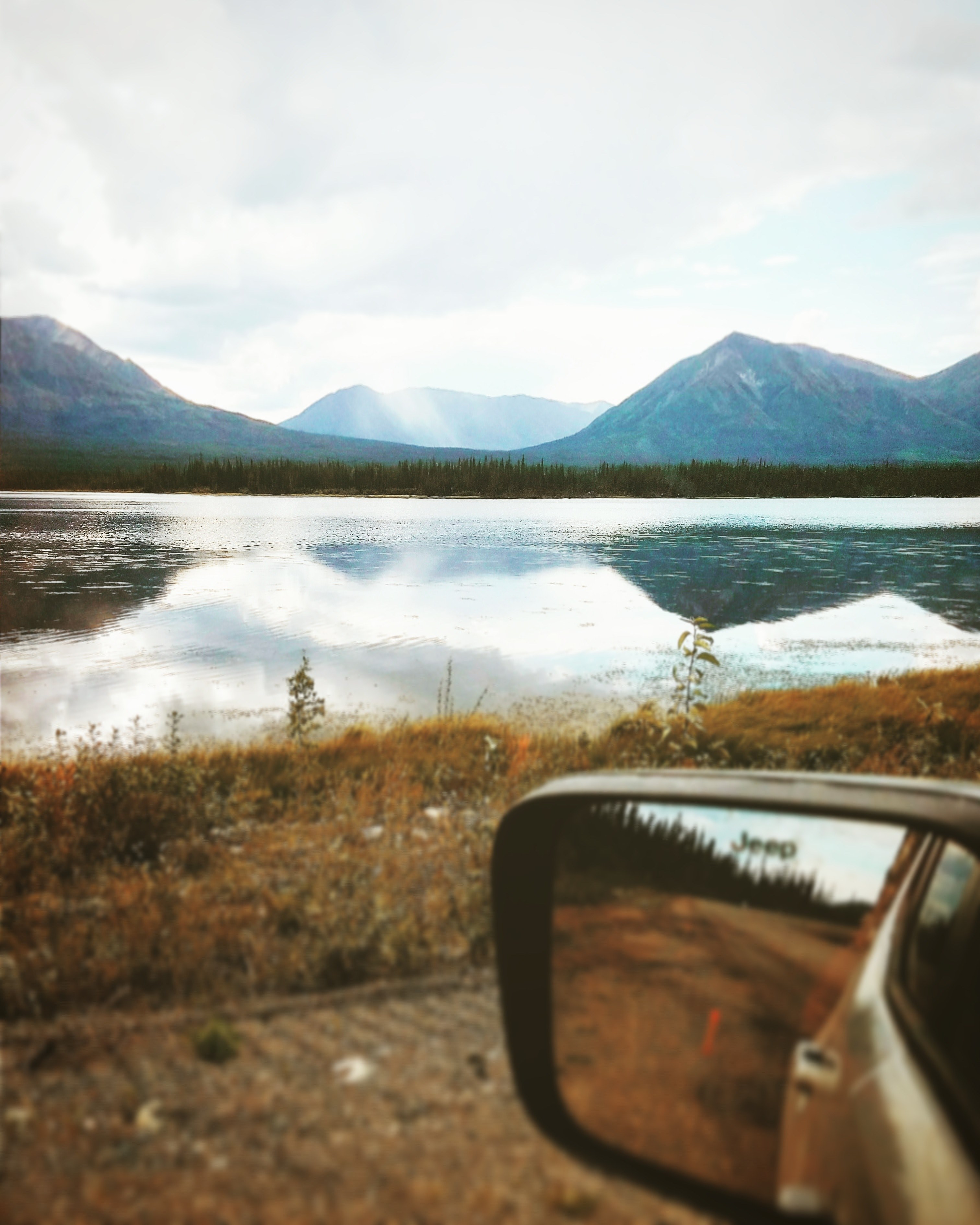 view from a car on its mirror and a quiet lake in the mountains, in a car over a lake 4k, Phone HD Wallpaper