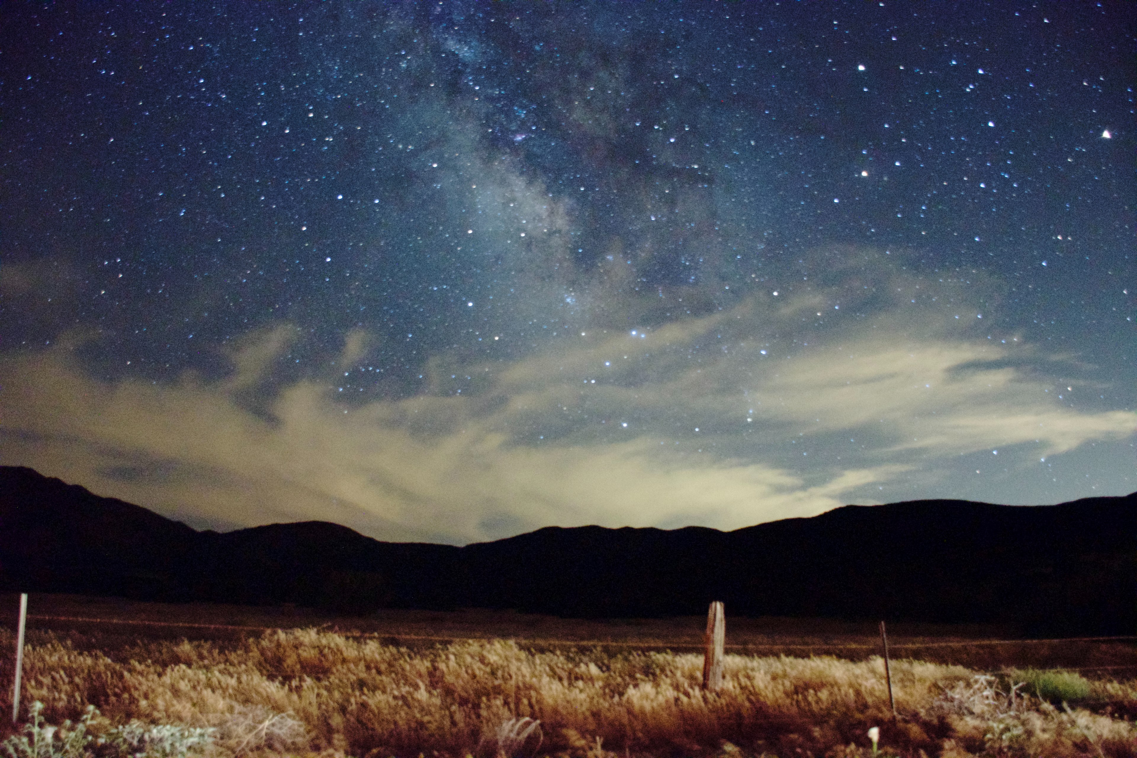 starry night sky over a golden grassland in the mountains, stars over mountain grassland 4k, HD Wallpaper
