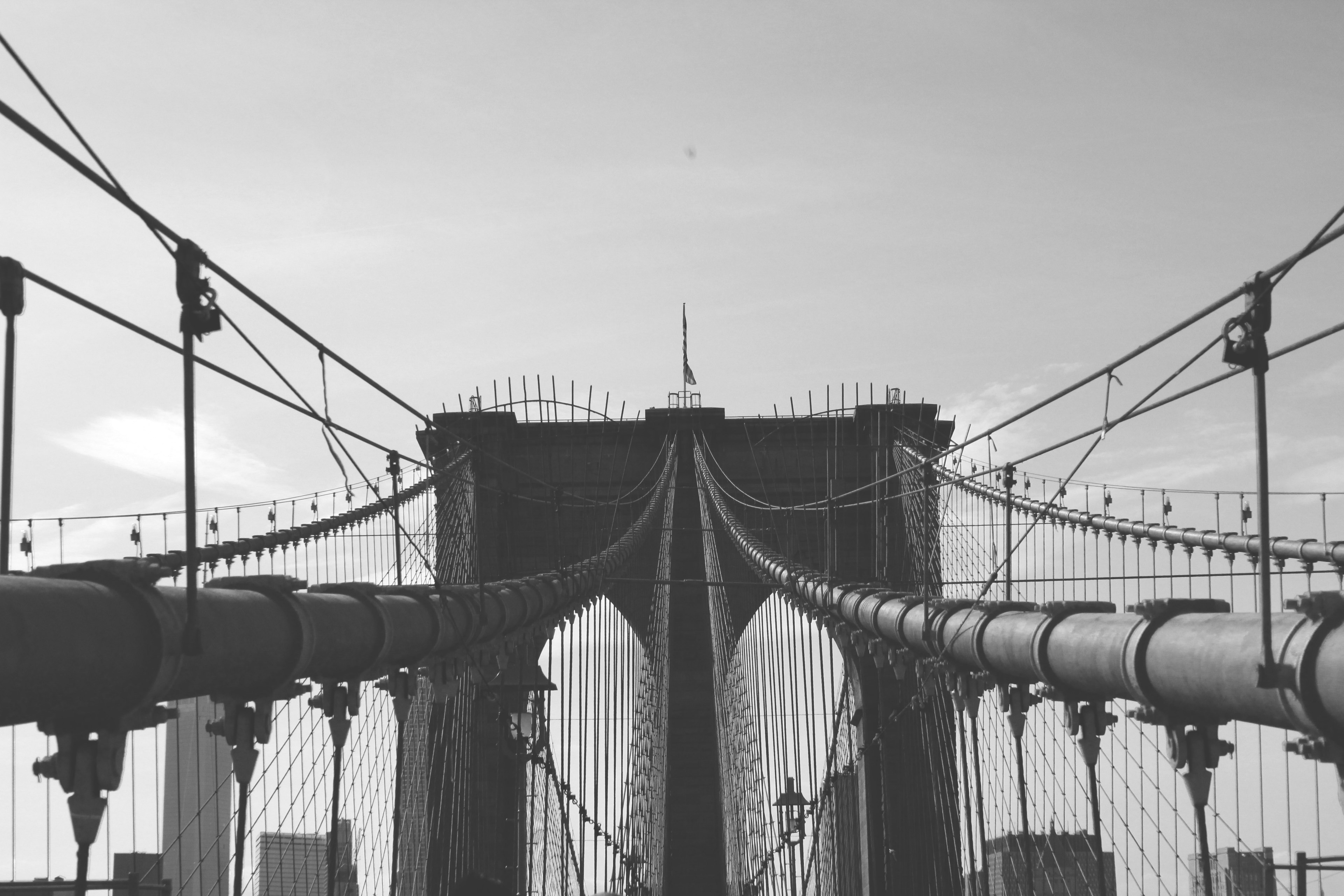 black and white photo of the brooklyn bridge suspensions in new york city, crossing the east river 4k, HD Wallpaper