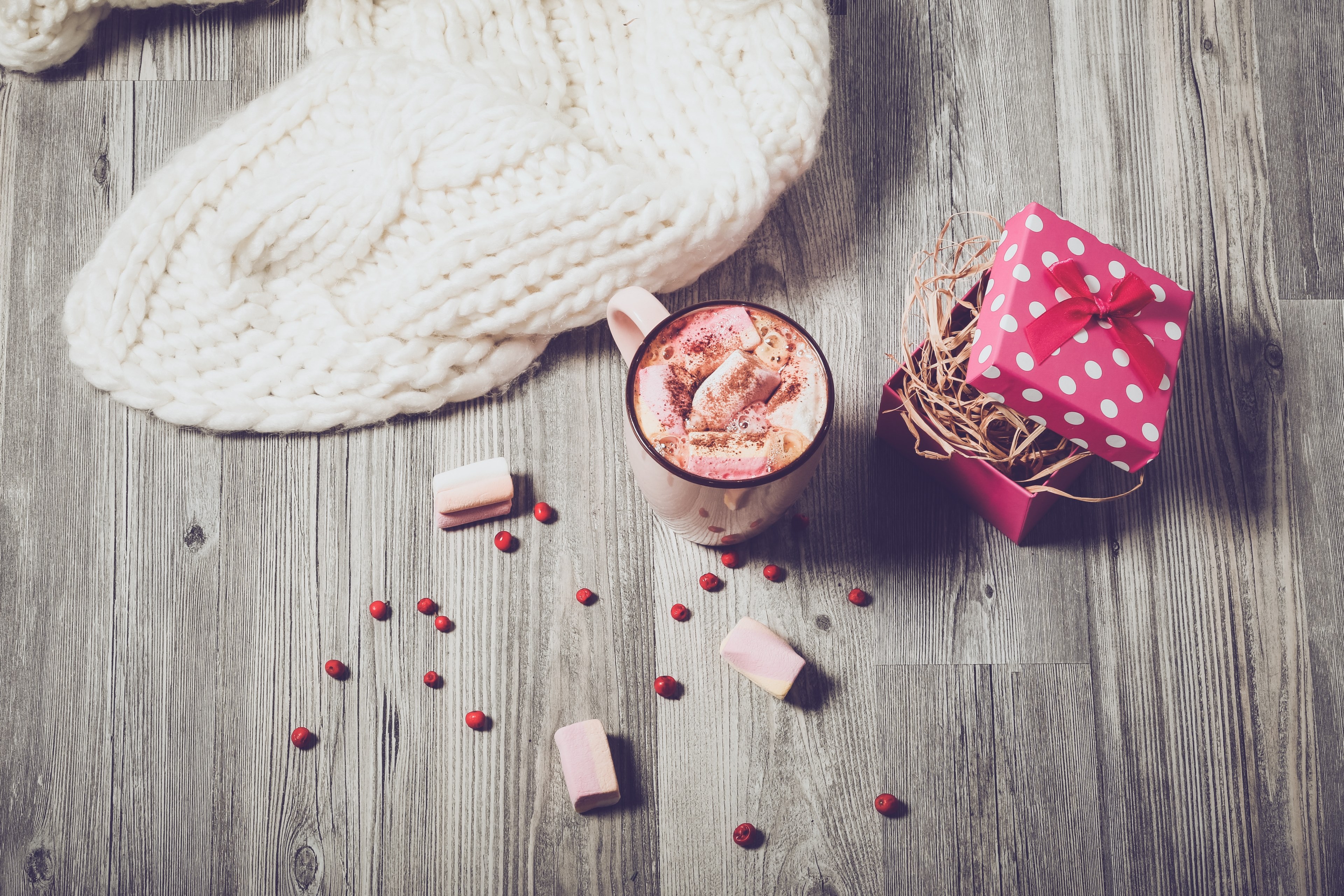 a hot beverage surrounded by berries a knitted item and a gift wrapped box containing straw, _christmas 4k, HD Wallpaper