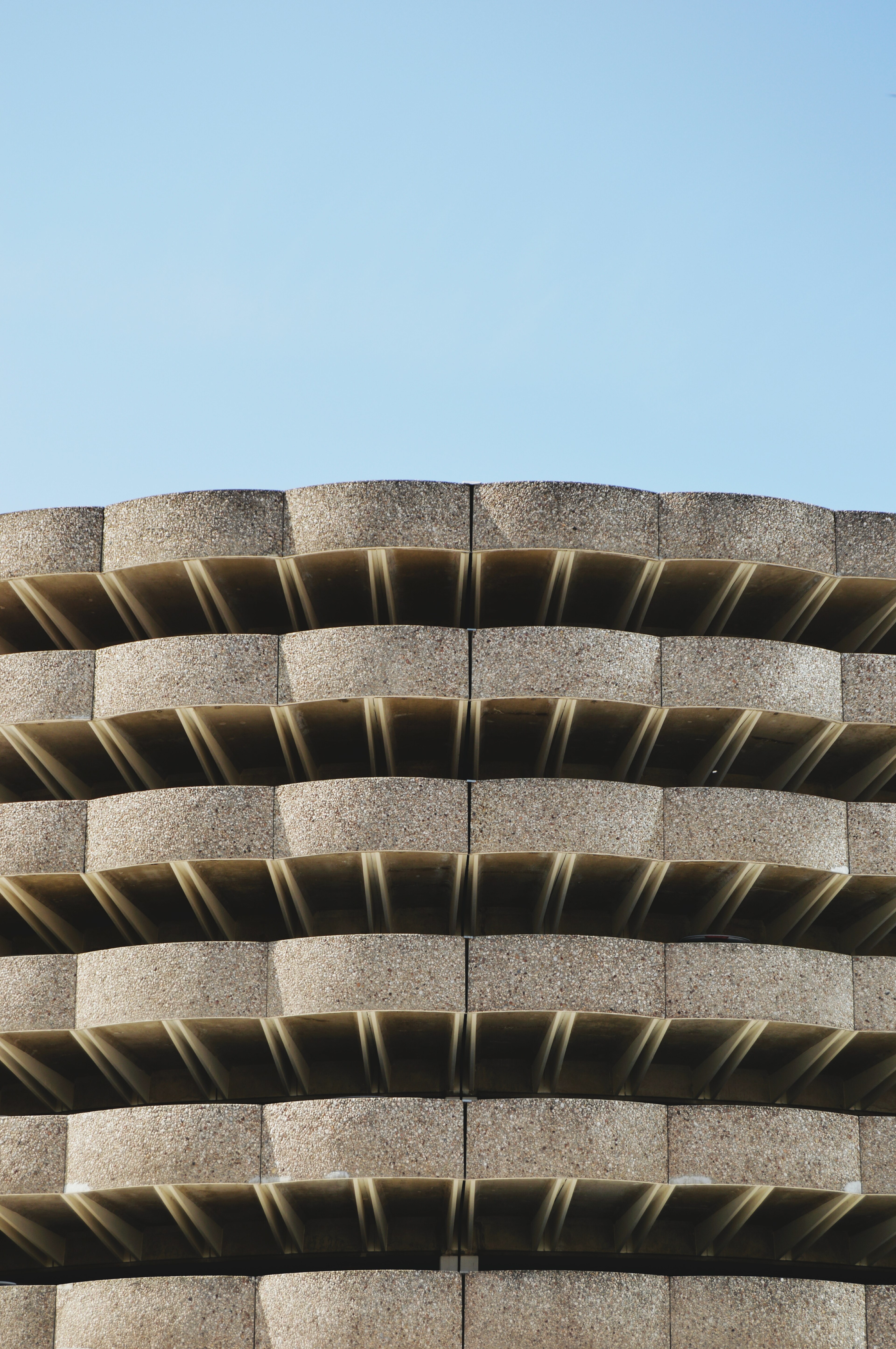 the concrete exterior of a multi story parking lot, sometimes 4k, Phone HD Wallpaper