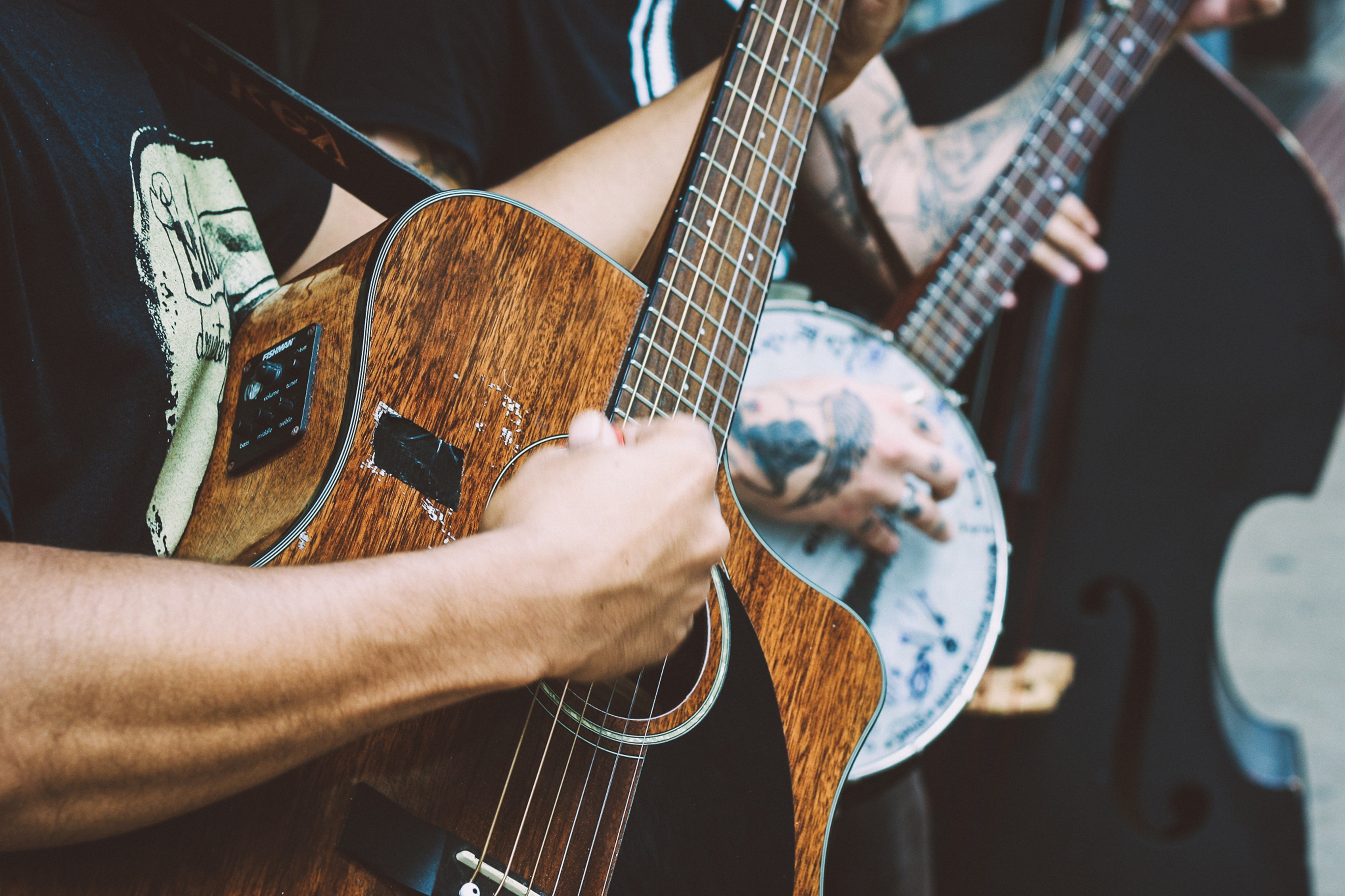 a close up of a mans hand clutching a pick and playing a worn out acoustic guitar, my first guitar 4k, HD Wallpaper
