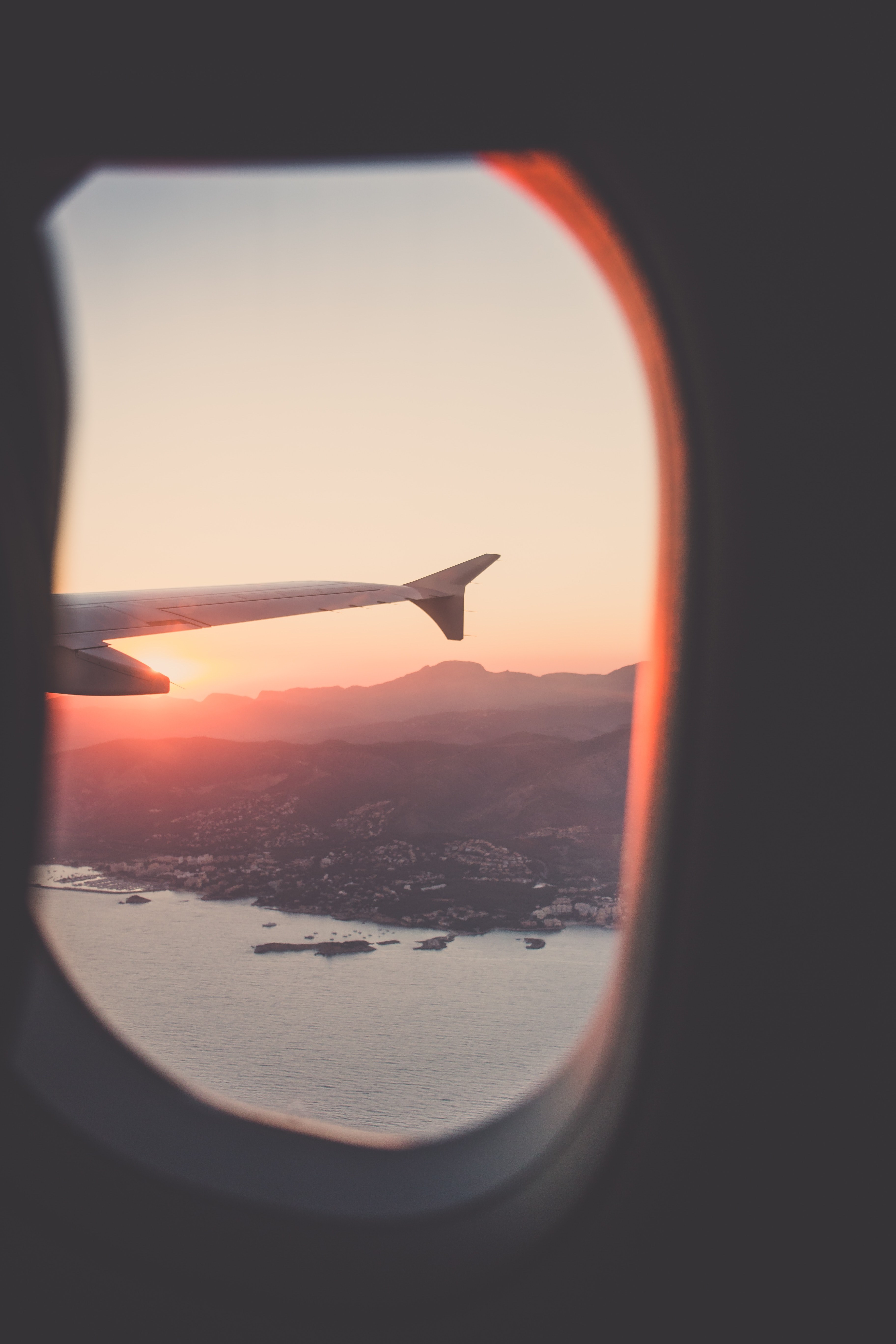 a sunset shore of majorca spain viewed from an airplane window, majorca sunset from above 4k, Phone HD Wallpaper