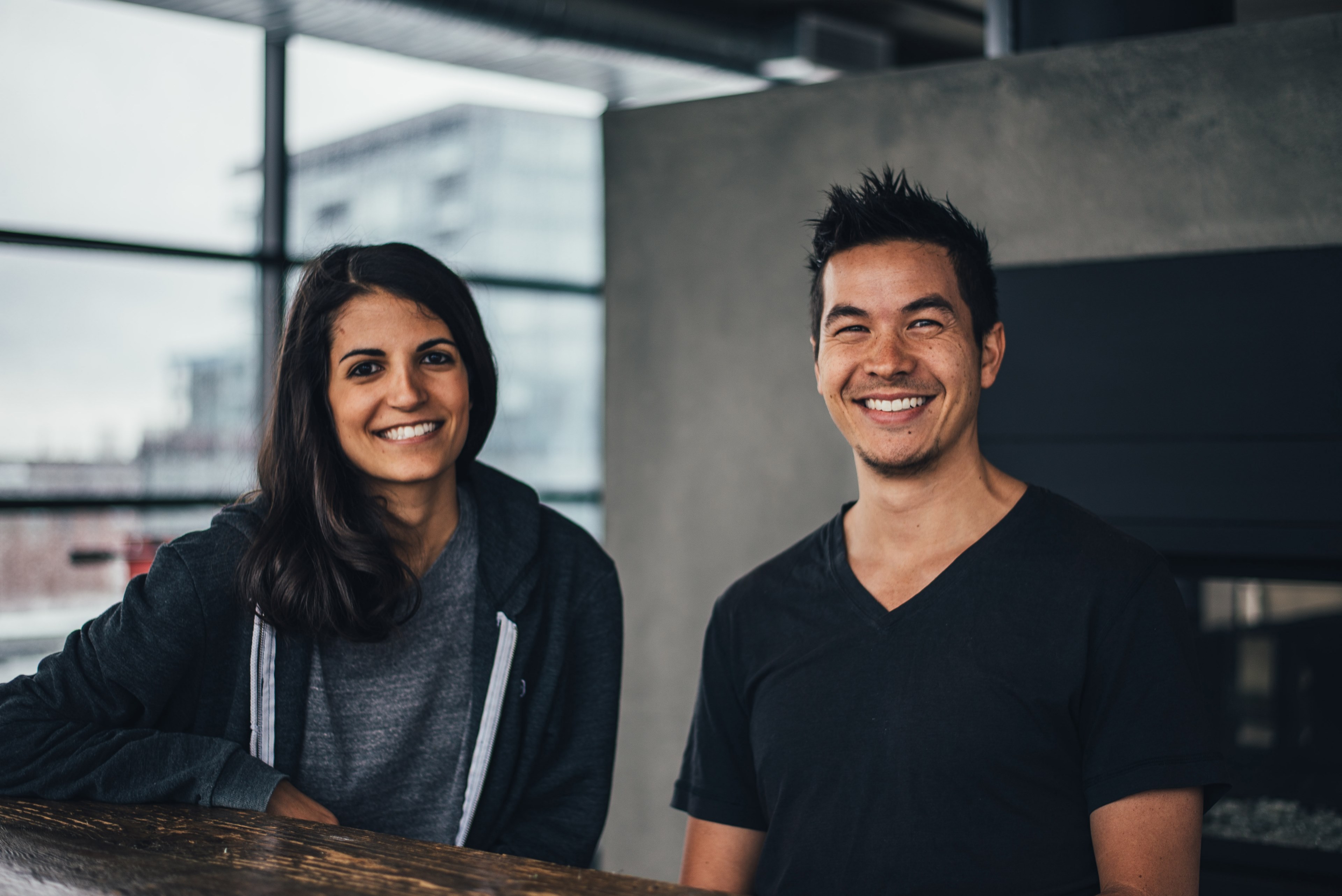 man and woman smiling contentedly inside a loft, happy today together 4k, HD Wallpaper