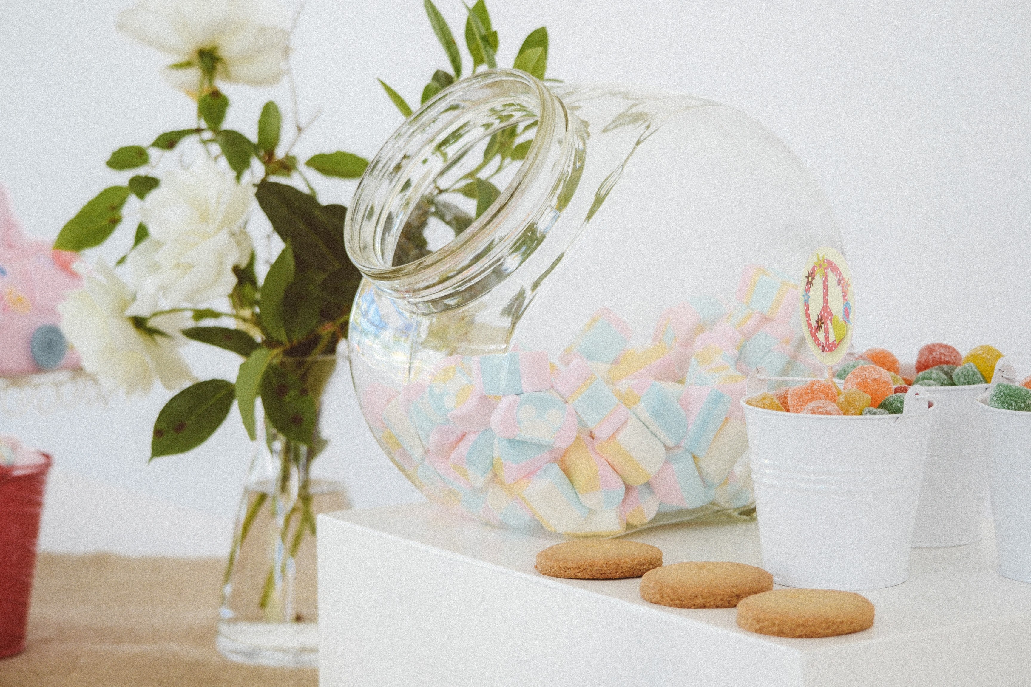 a large jar full of colorful marshmallows next to cookies and cups of candy, childhood dreams 4k, HD Wallpaper