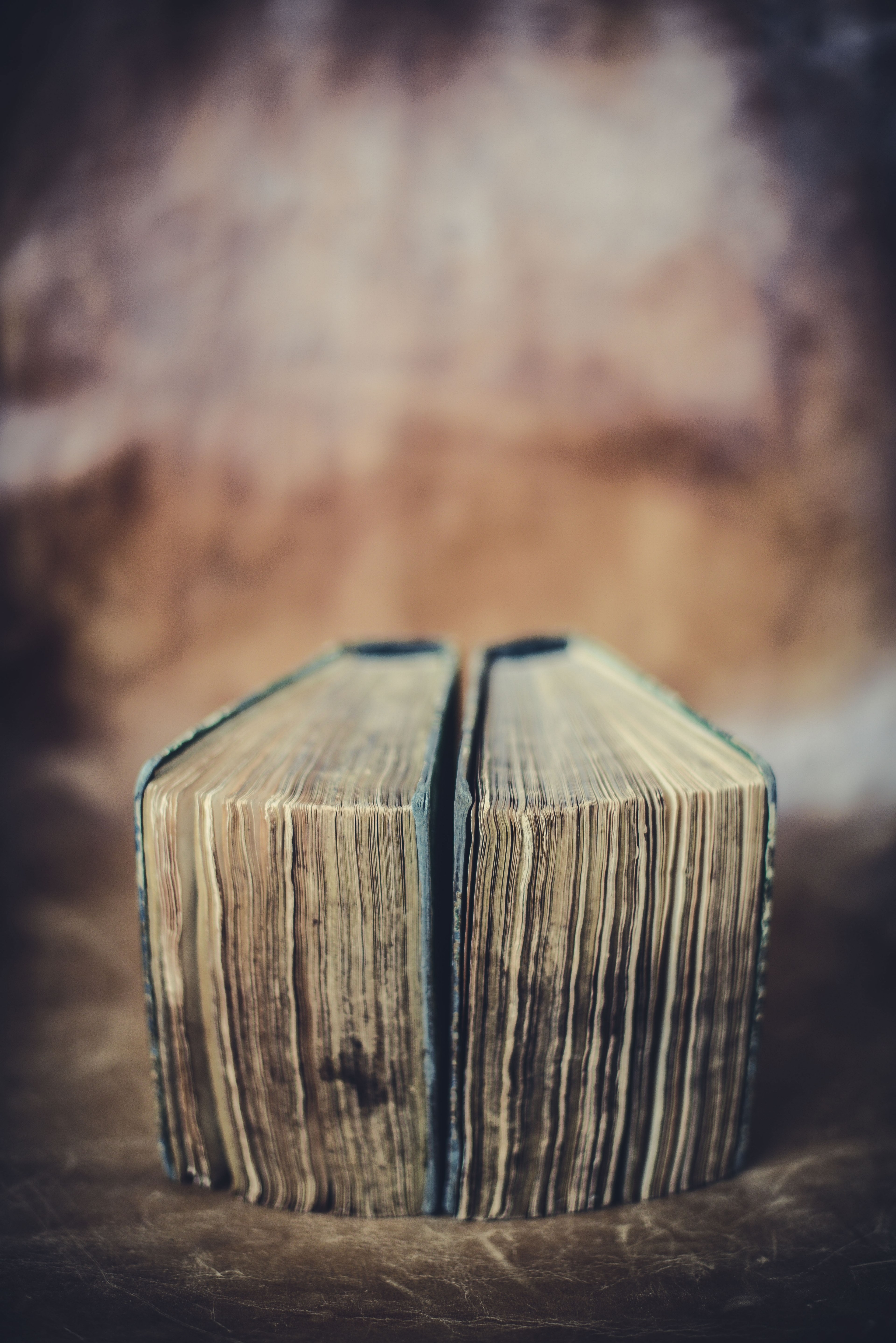 two vintage hardcover books with deteriorating pages laying next to each other, _books 4k, Phone HD Wallpaper