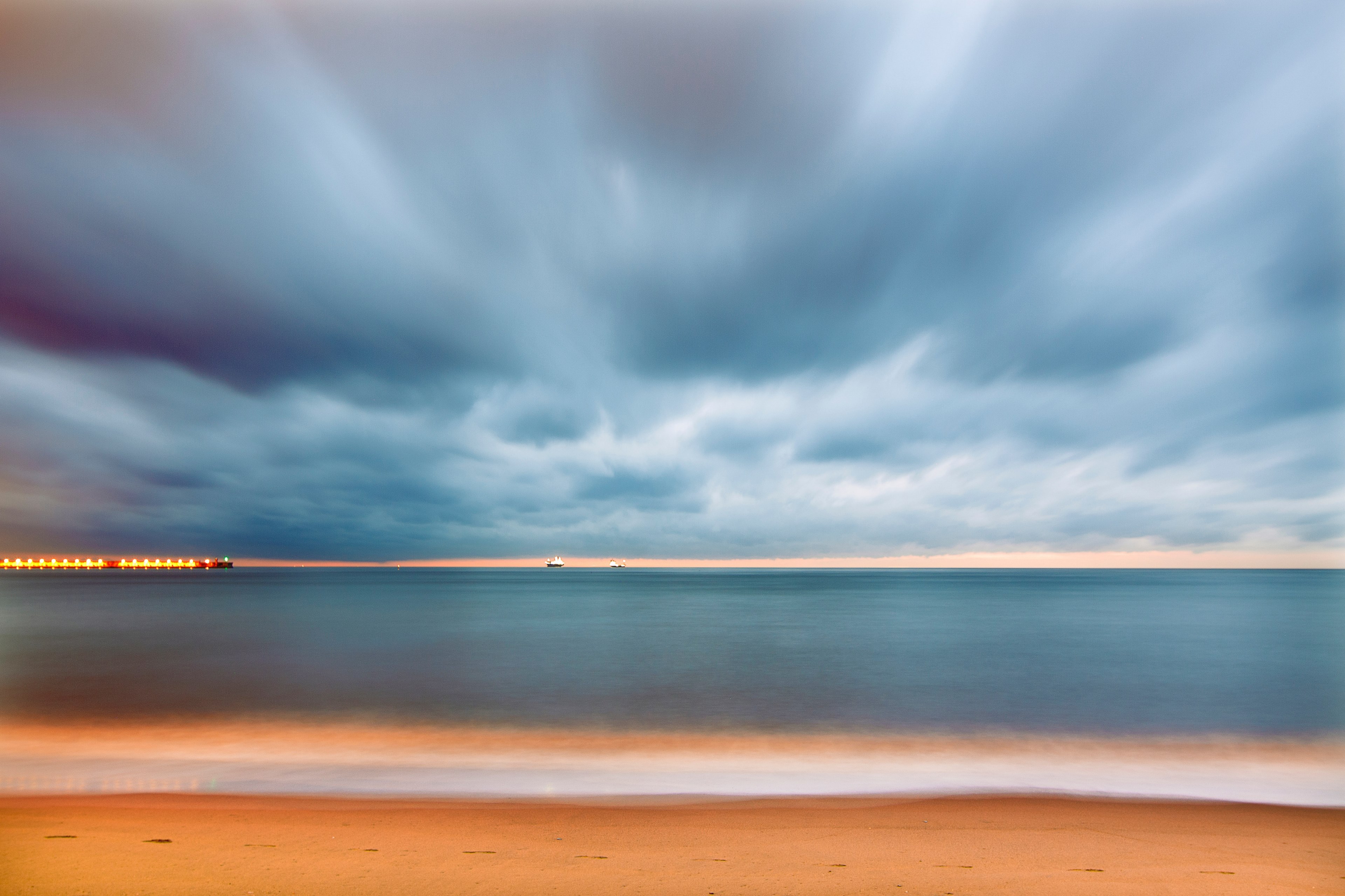 a scenic sunset with cloudy skies casting over playa de la misericordia in malaga, sunset over a beach in malaga 4k, HD Wallpaper
