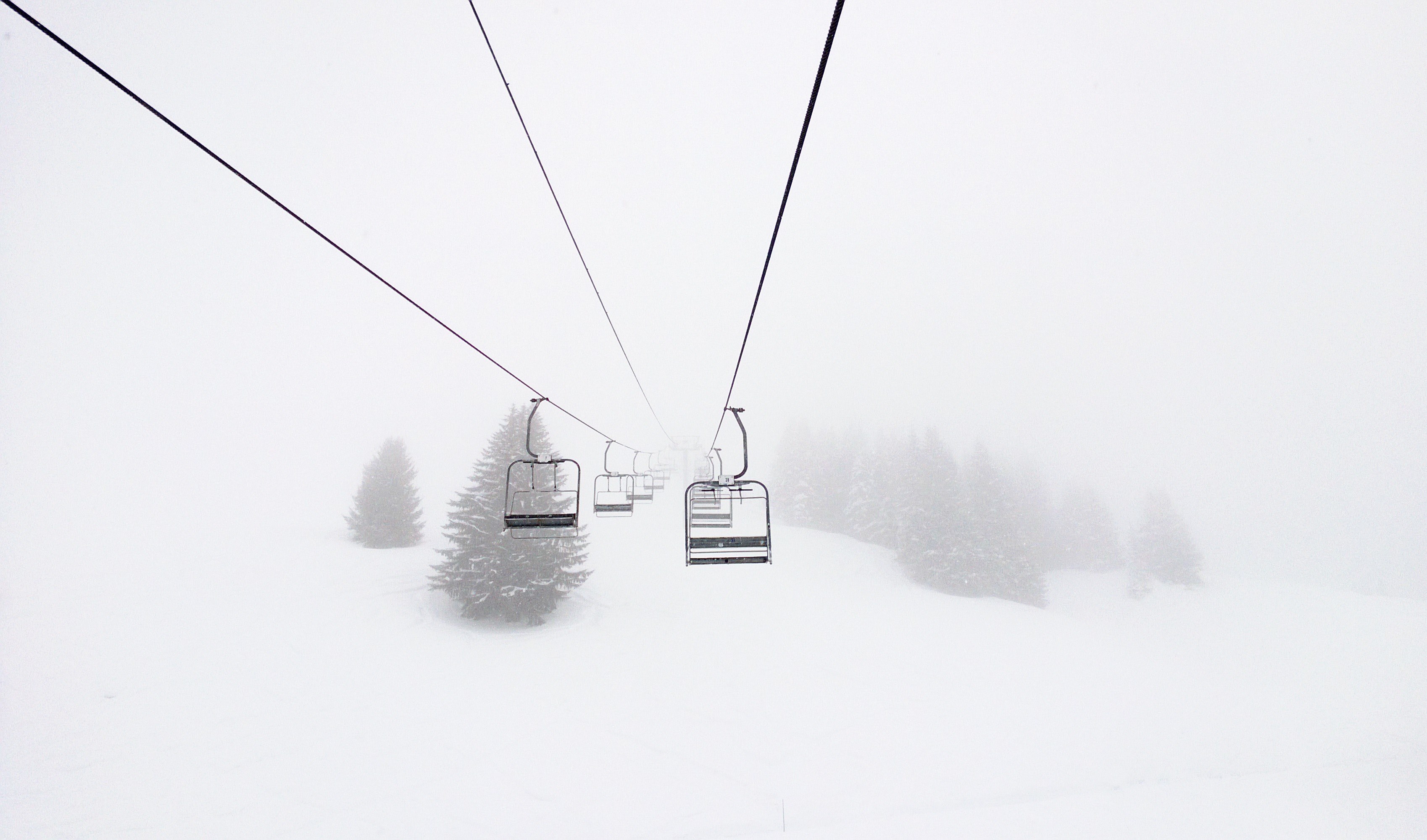 chairlifts on a snowy ski slope in morillon, misty ski lifts 4k, HD Wallpaper