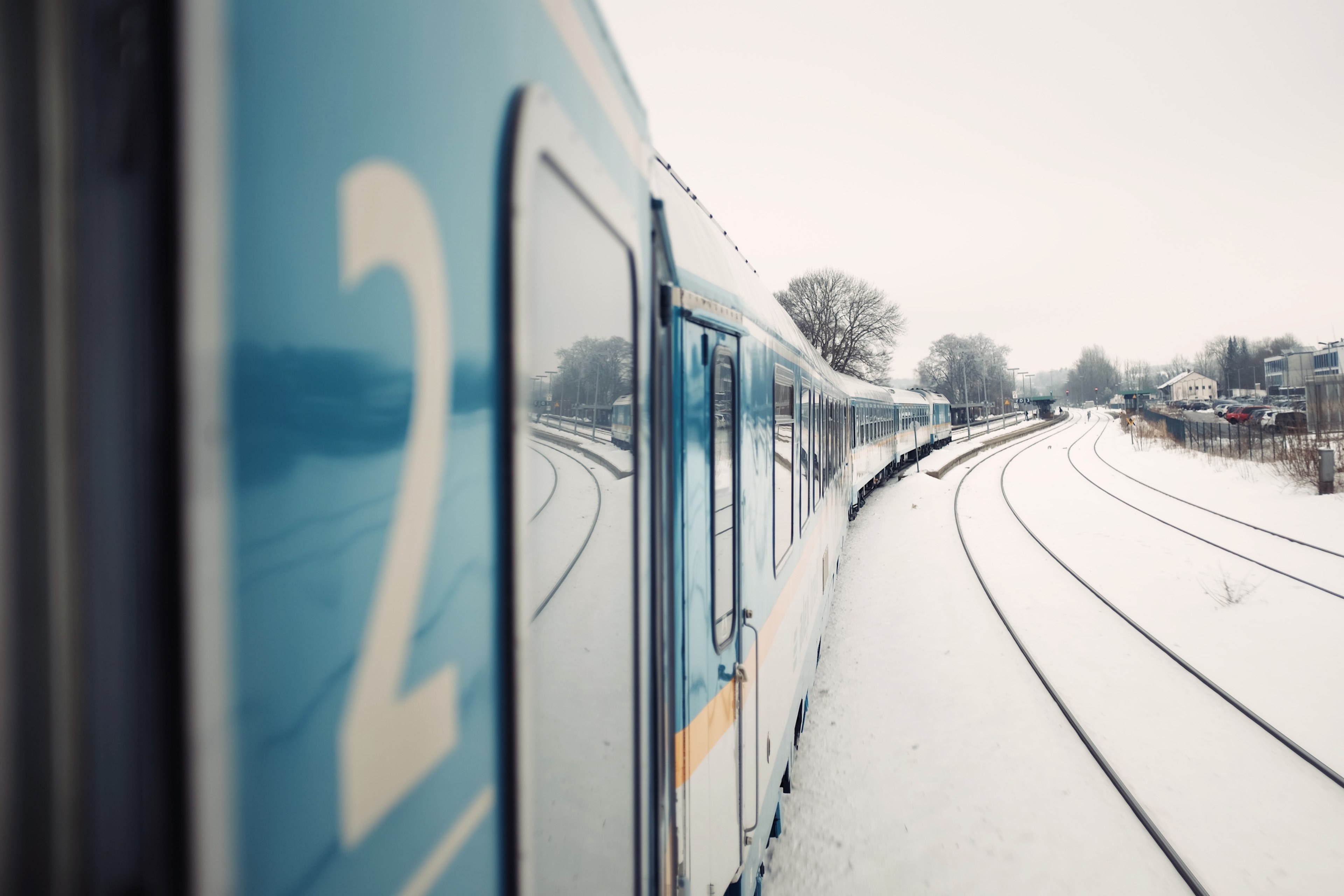 the railway tracks covered in snow as seen from the side of the train, _going home 4k, HD Wallpaper