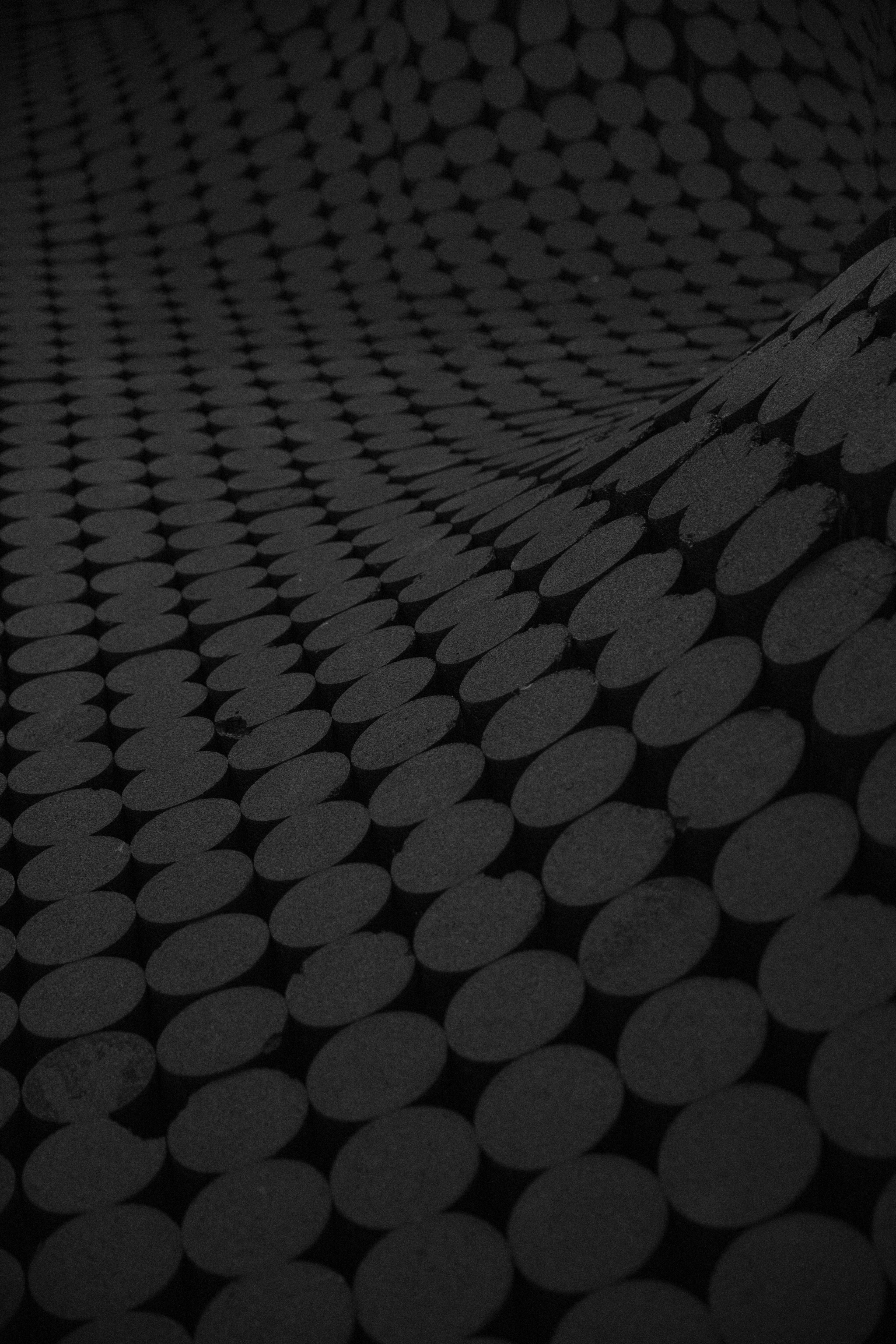 an undulating surface with a pattern of gray circles on a black texture, undulating negative space 4k, Phone HD Wallpaper