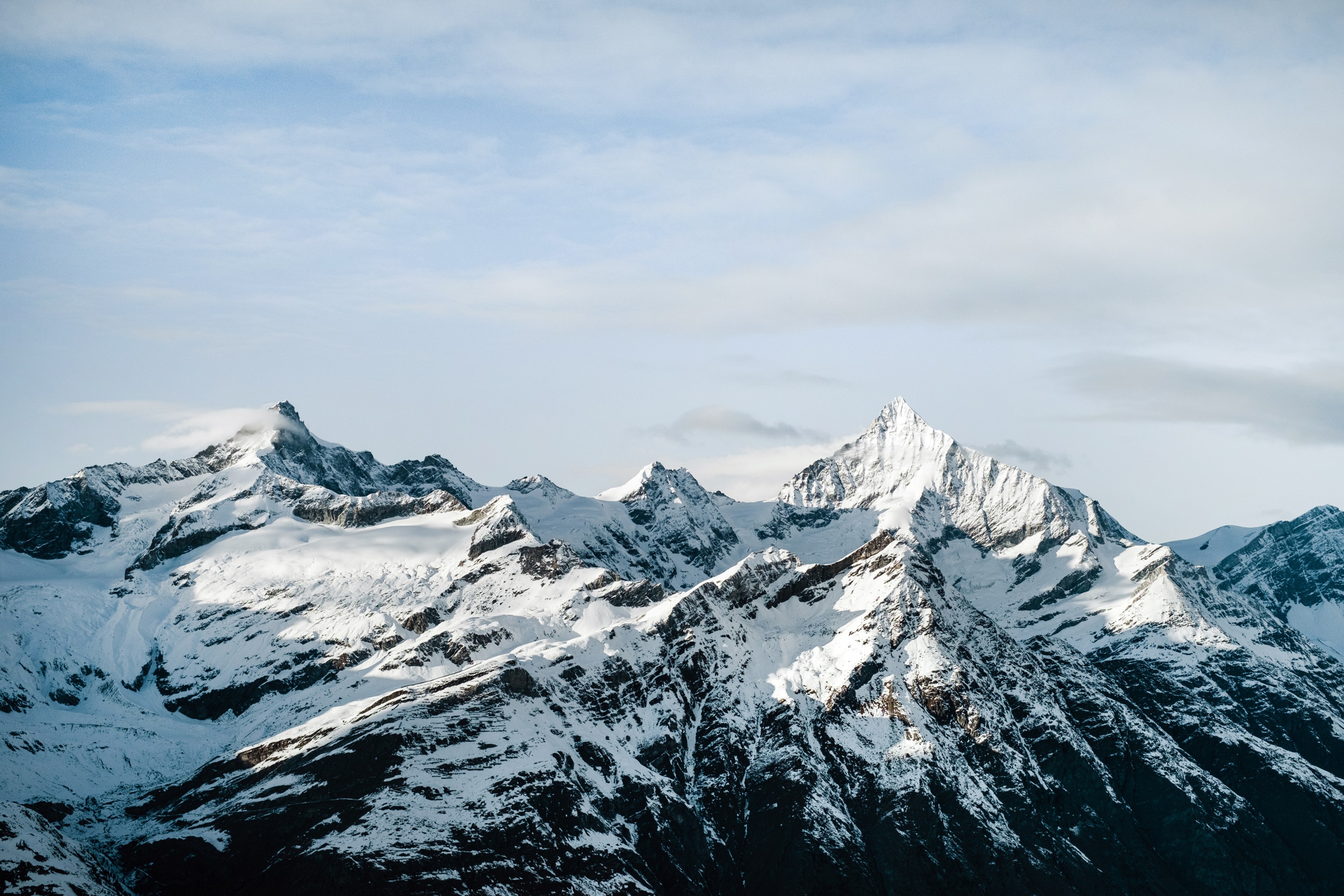 scattered clouds over the snowy ridge of gornergrat in the alps, gornergrat ridge under patchy clouds 4k, HD Wallpaper