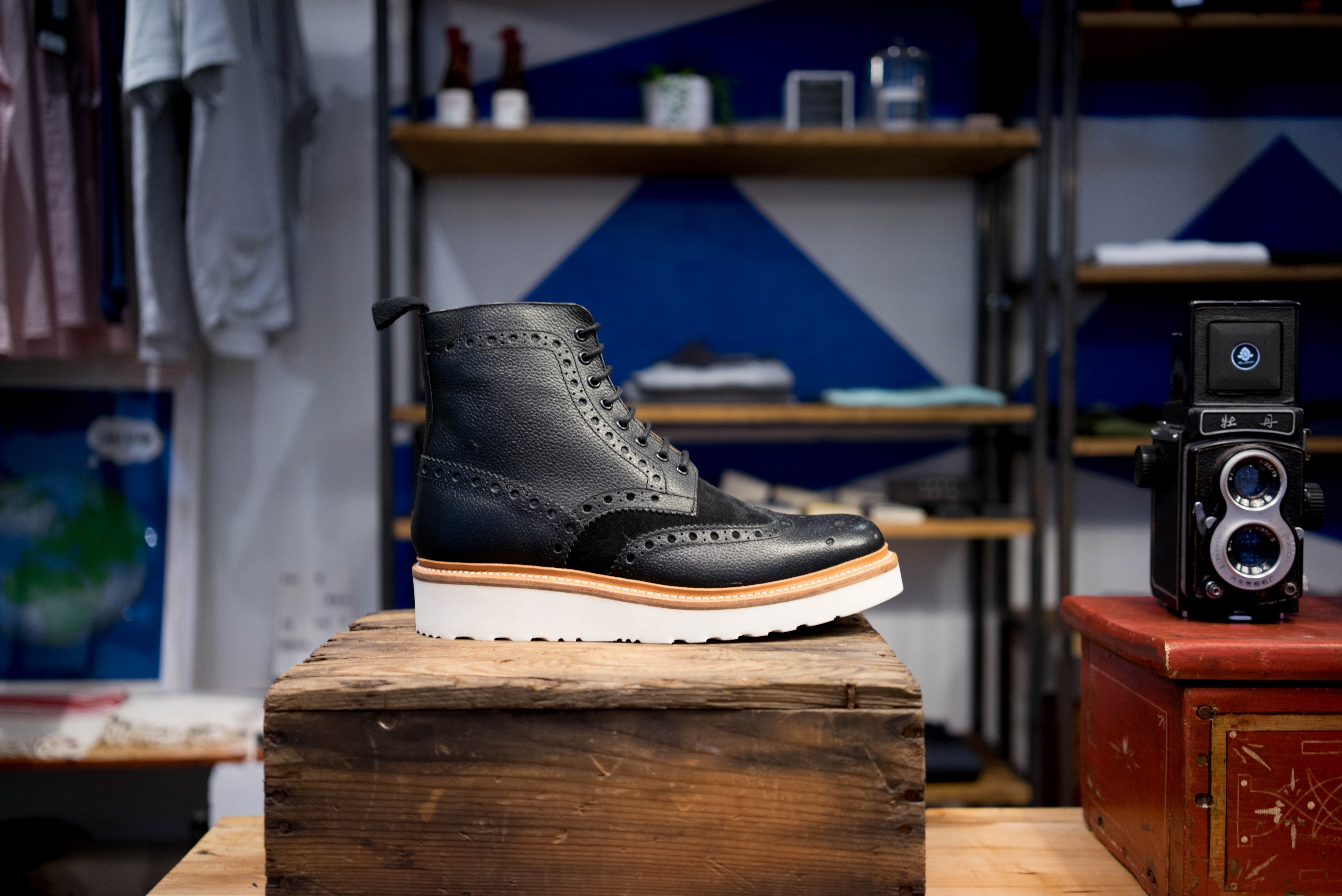 a black leather boot on a wooden box in a store, black boot in a store 4k, HD Wallpaper
