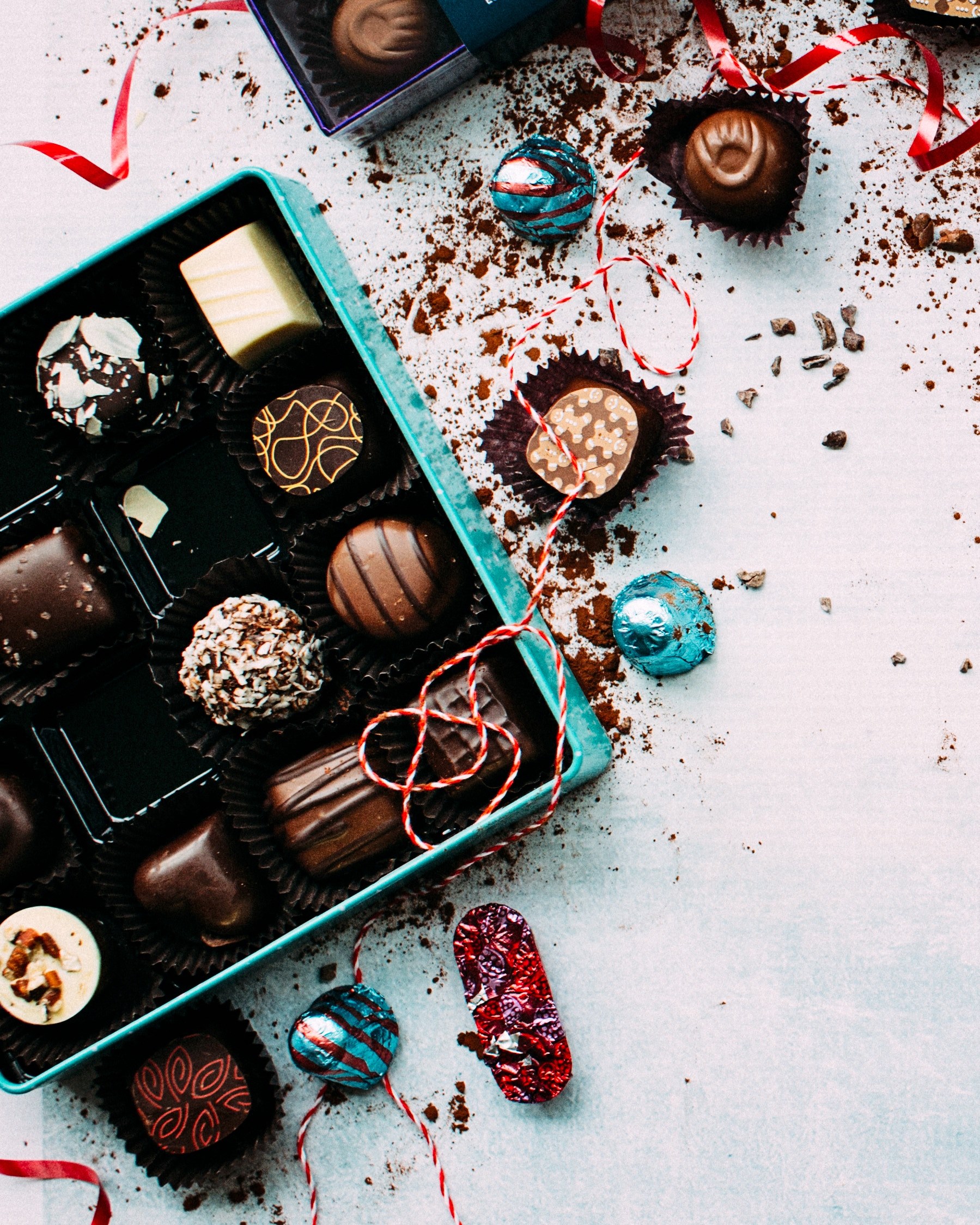 box of gourmet chocolates on a christmas themed tablescape, christmas chocolates 4k, Phone HD Wallpaper
