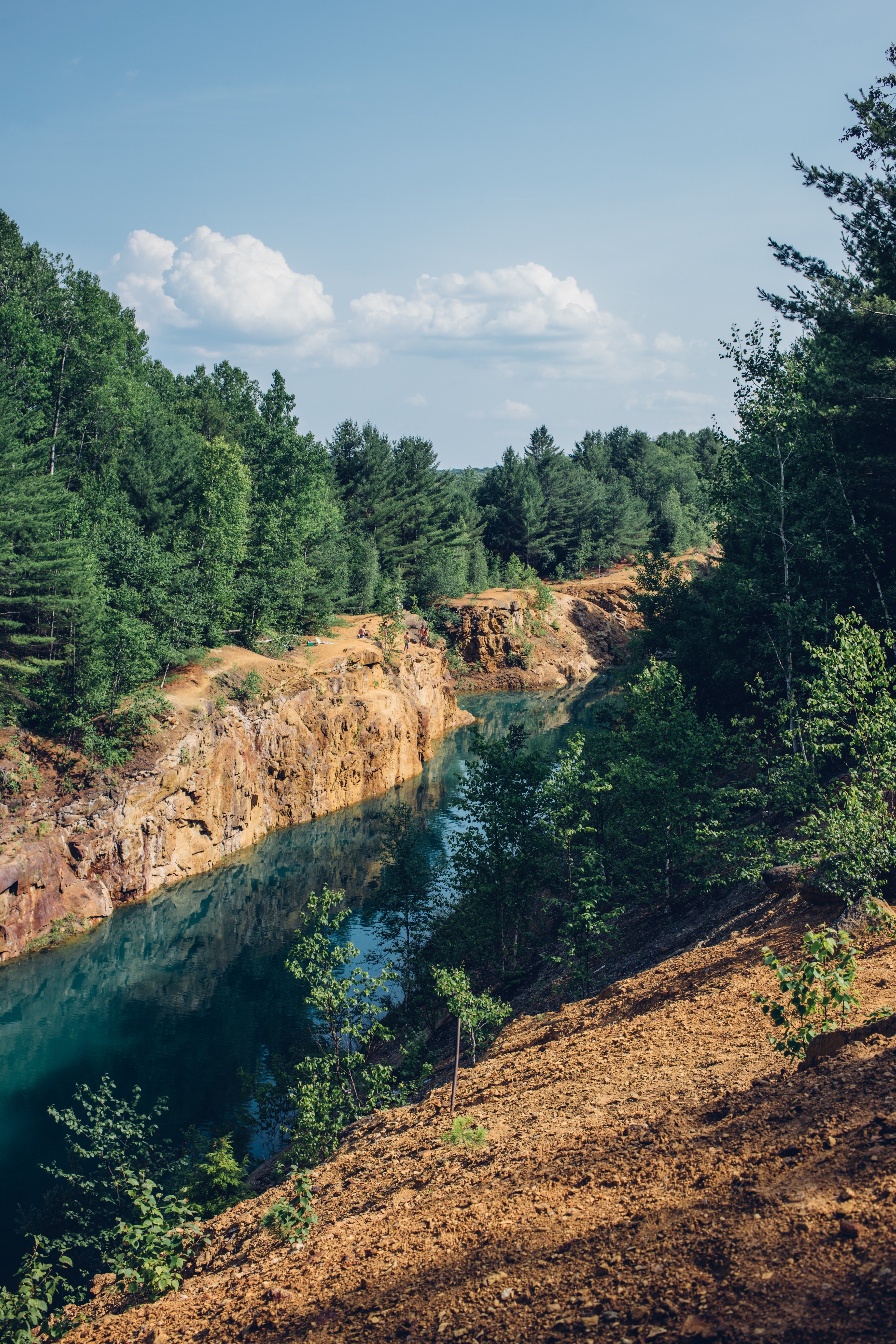 a blue river flowing between red rocks in strafford, copper mines 4k, Phone HD Wallpaper