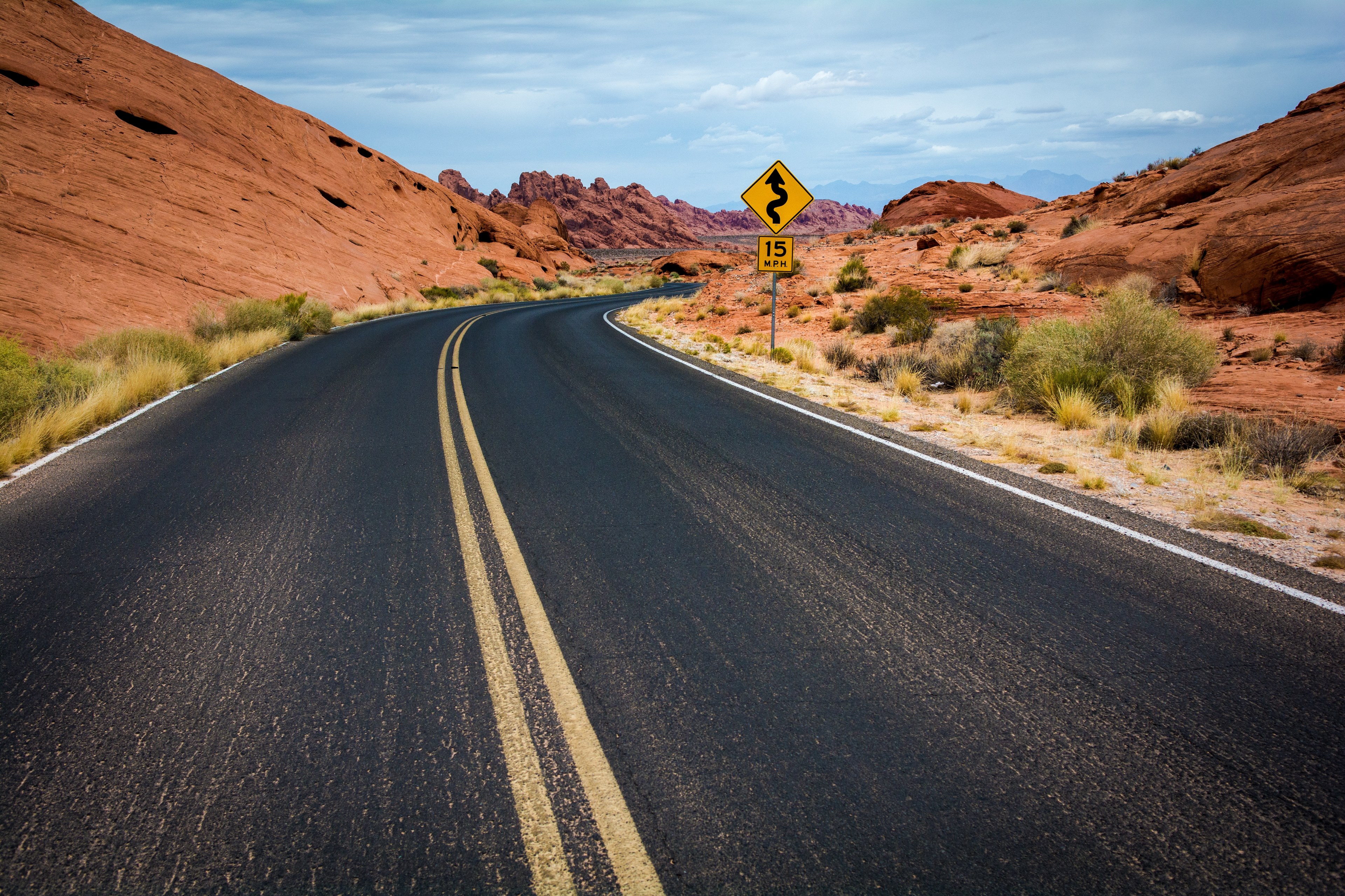 a winding asphalt road through the sandstone landscape of the valley of fire, sandstone lined road 4k, HD Wallpaper