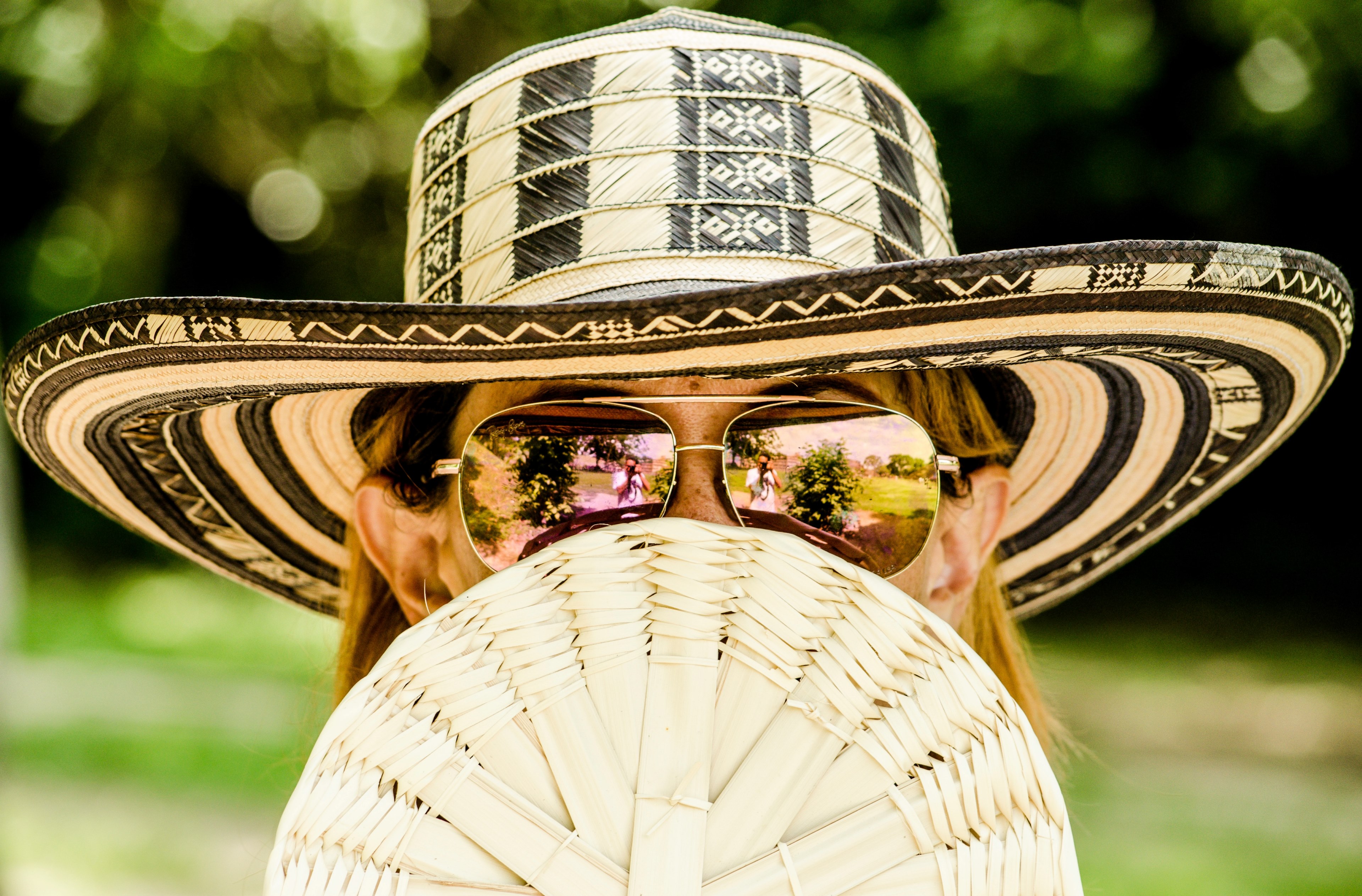 a blonde woman wearing a sun hat with sunglasses while holding a fan, woman holding fan 4k, HD Wallpaper