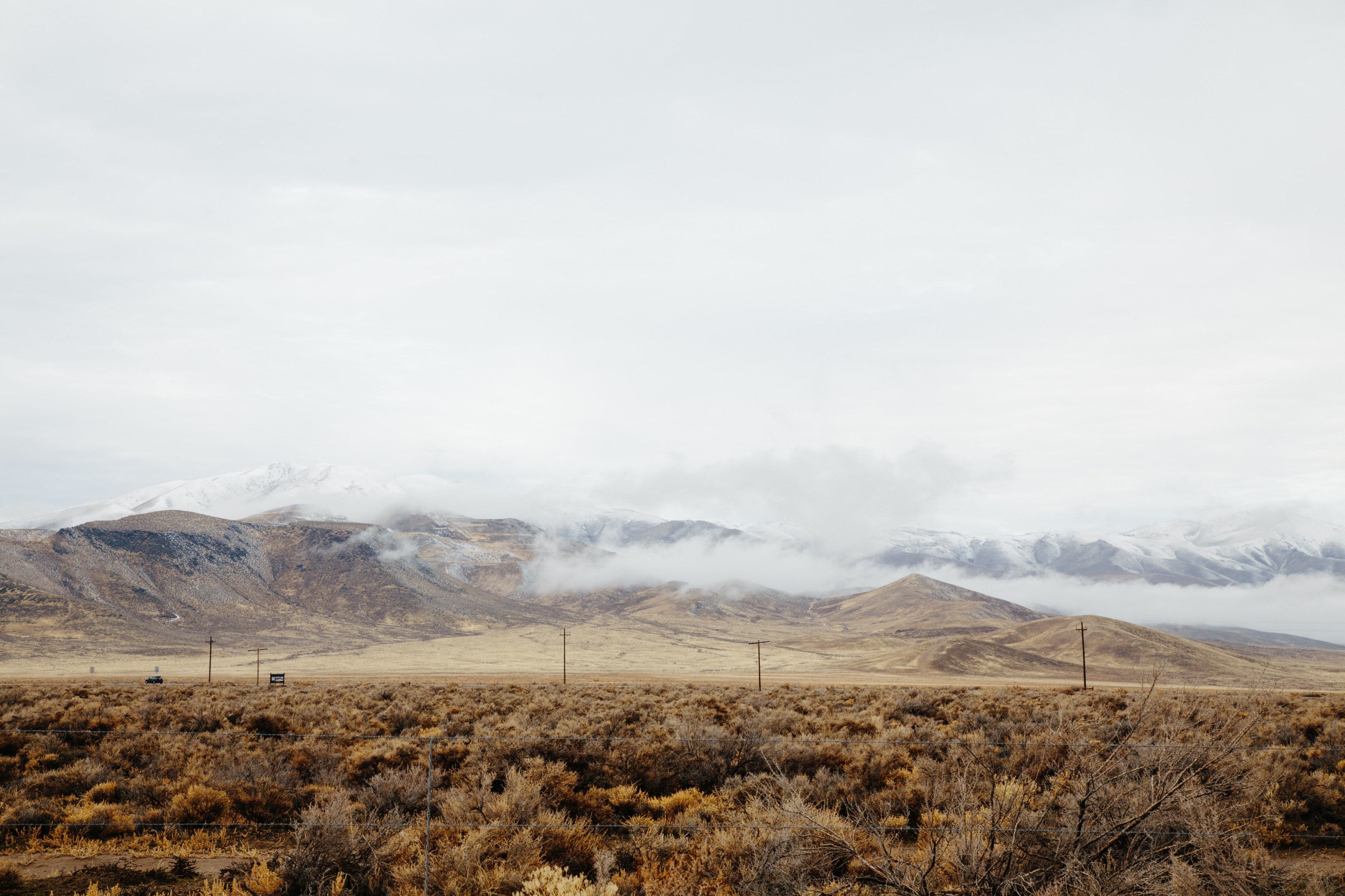 rural roads with power lines sit near snowy mountainsides, rural roads 4k, HD Wallpaper