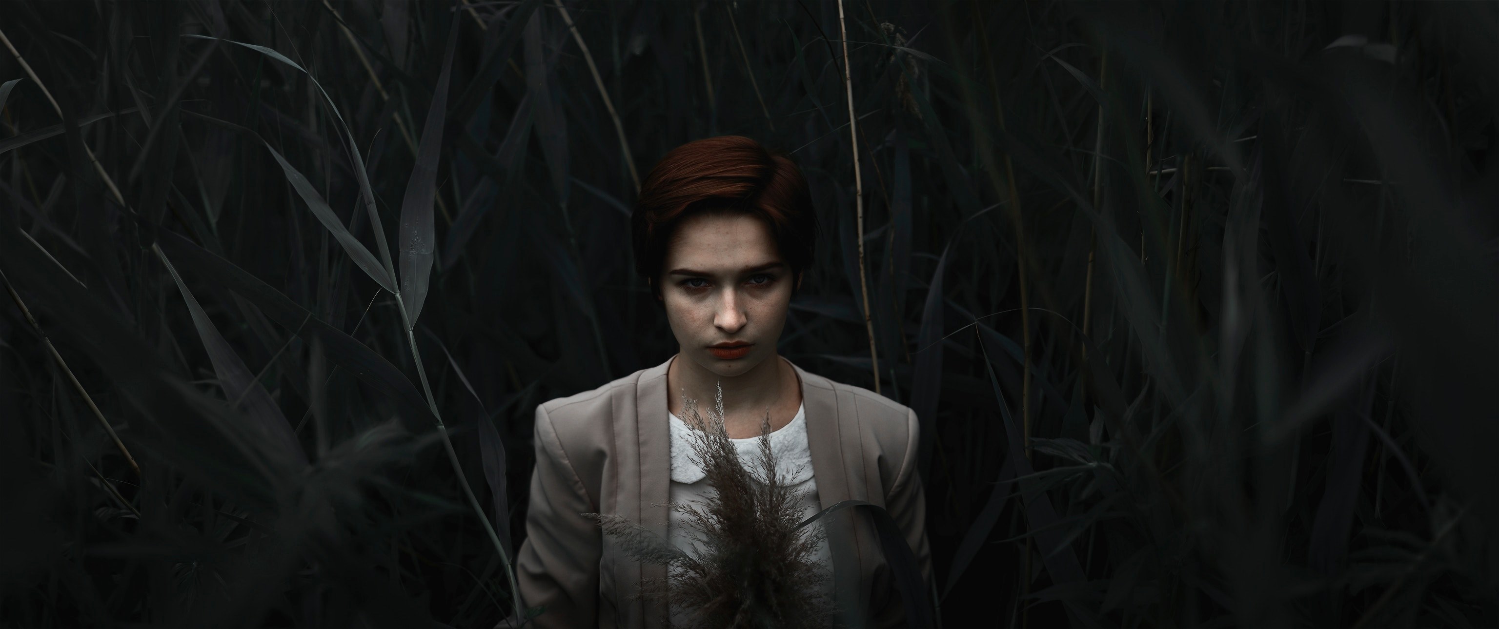 sad person standing alone in a dark leafy forest, stern looks 4k, HD Wallpaper