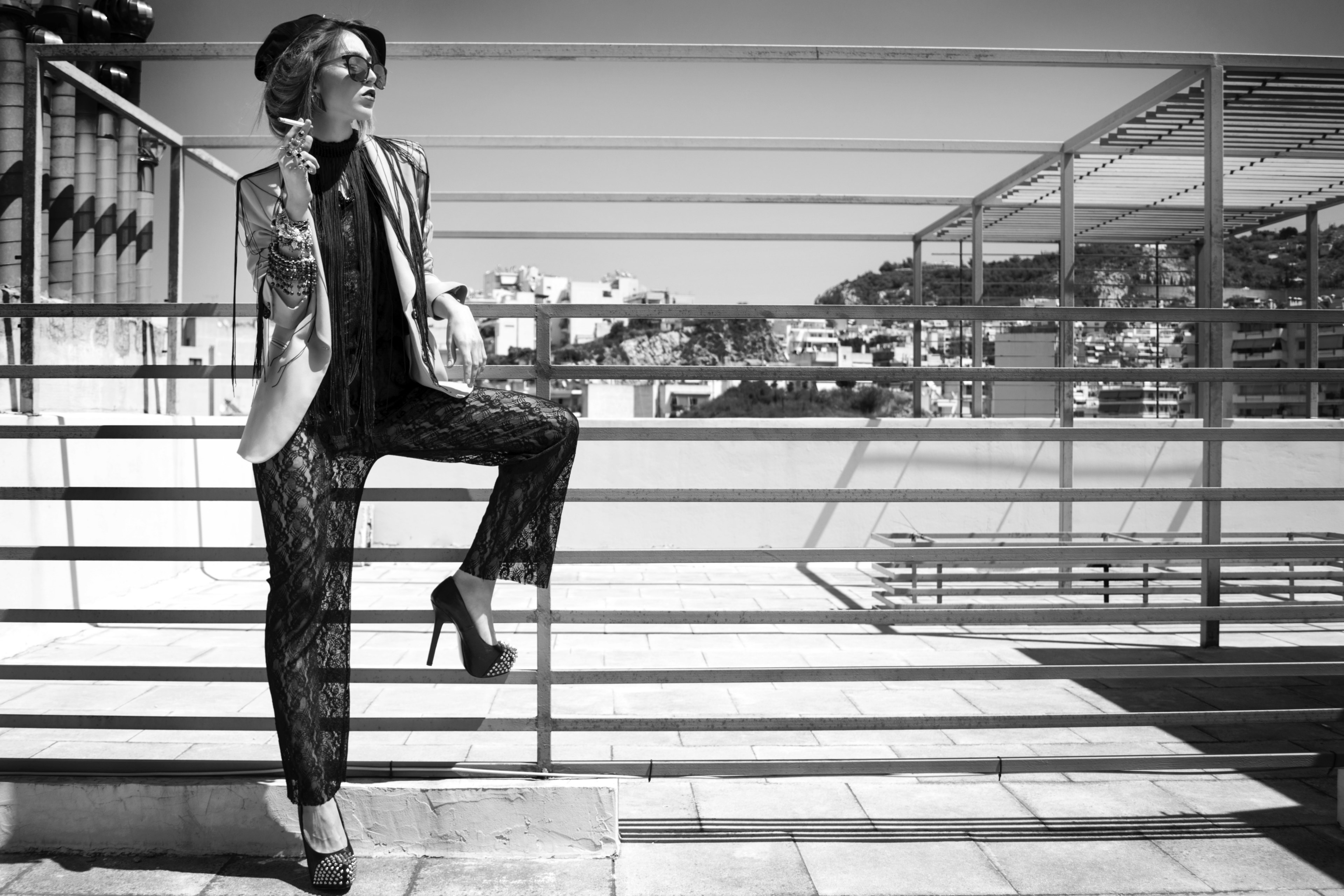 a woman in fashionable attire is seen smoking by the railing on a rooftop, _fashionable woman smoking 4k, HD Wallpaper