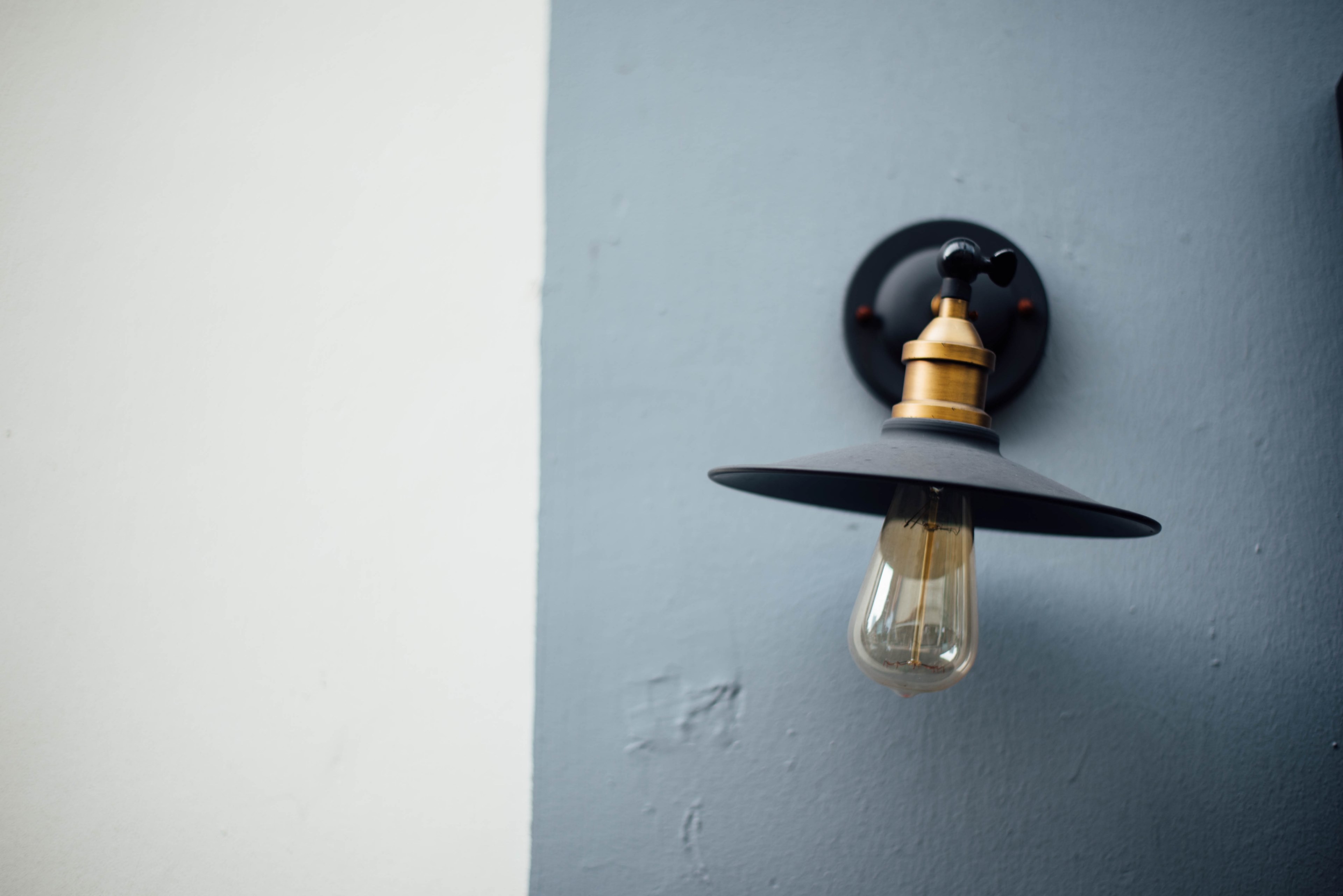 a lightbulb with a flat wide shade on a gray wall, flat lampshade 4k, HD Wallpaper