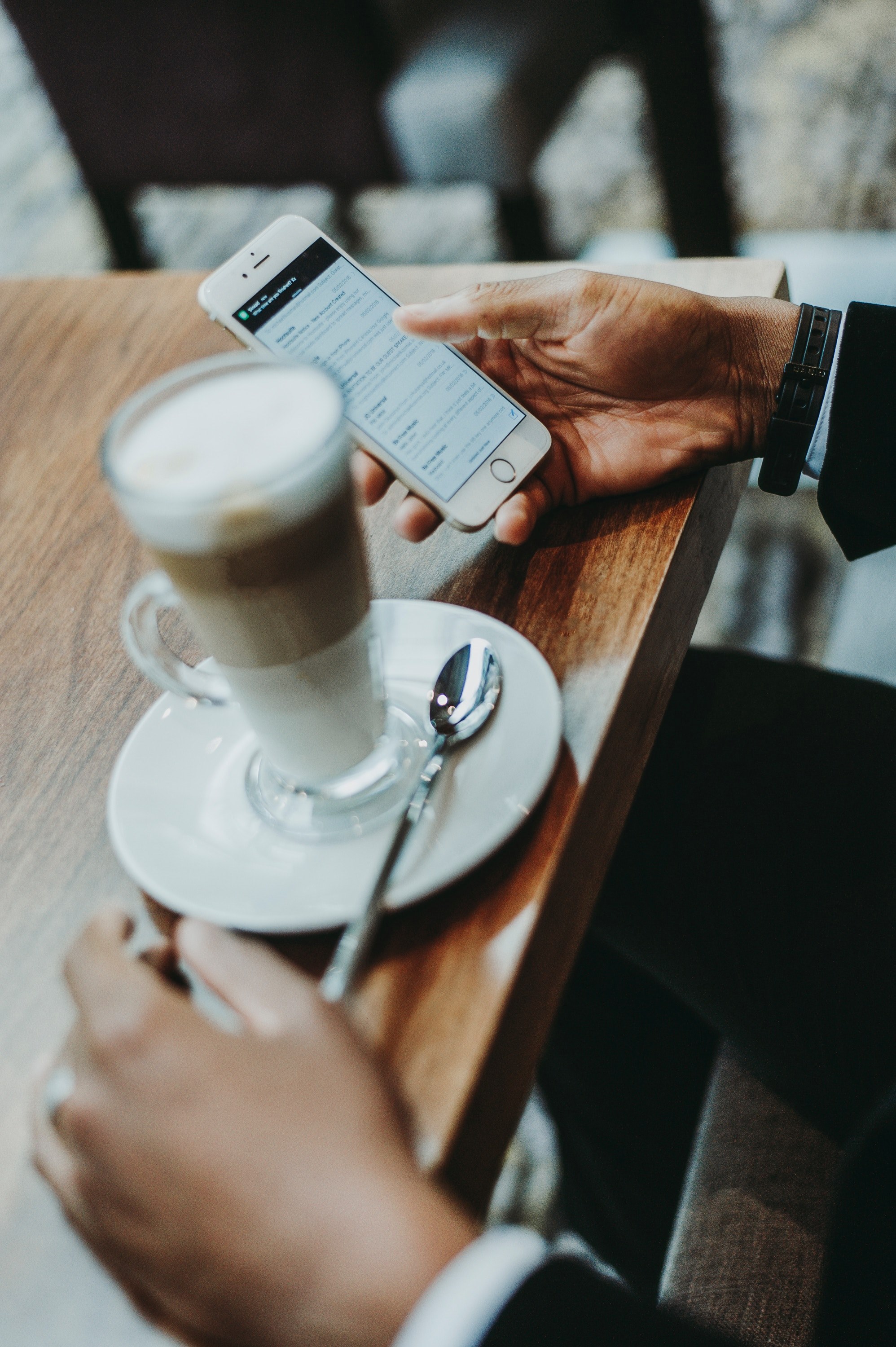 a man in a suit using an iphone while sitting over a tall coffee, iphone and tall coffee 4k, Phone HD Wallpaper
