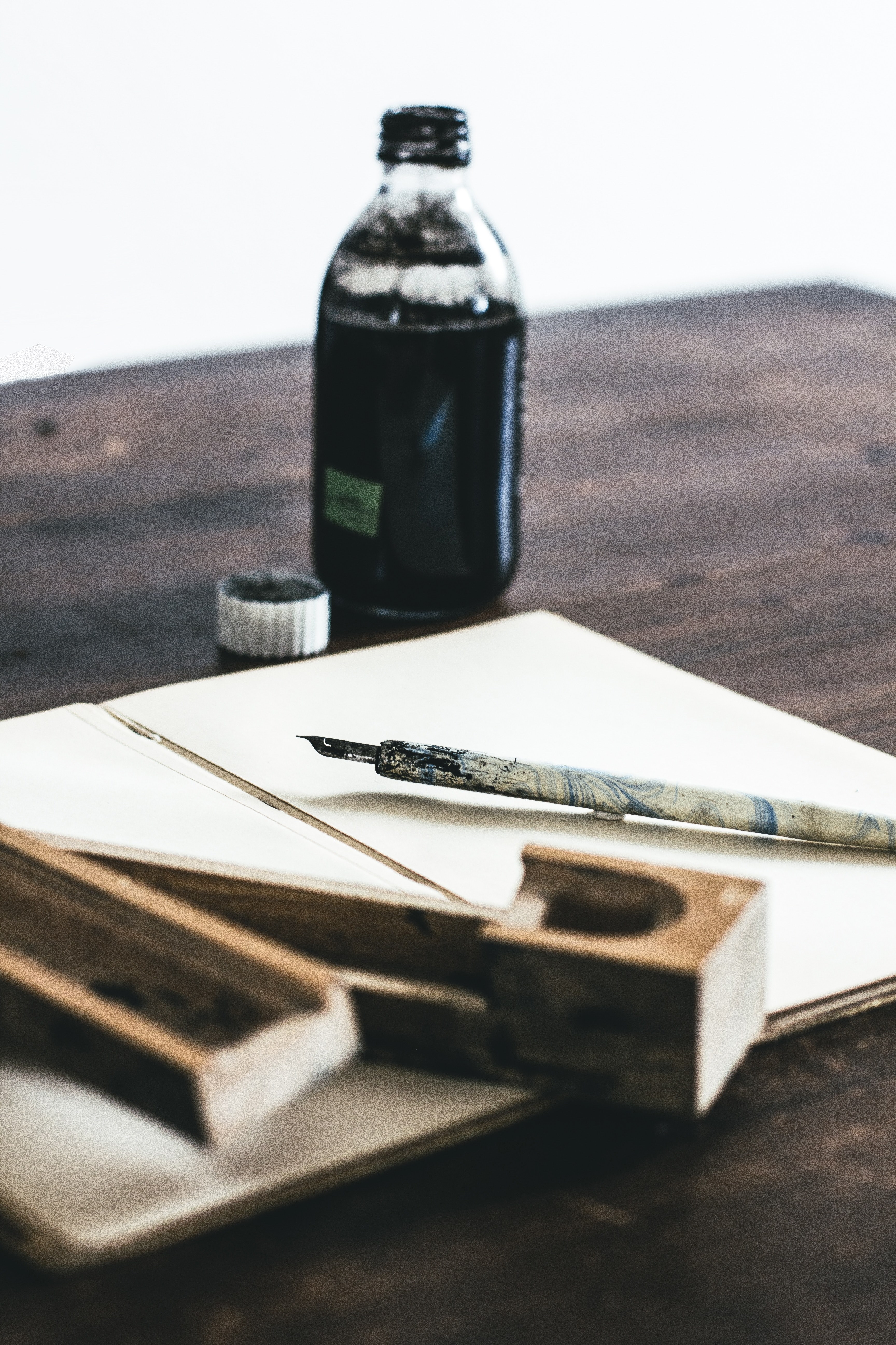 a paper a pen and ink on a wooden table in cologne, pen notebook 4k, Phone HD Wallpaper