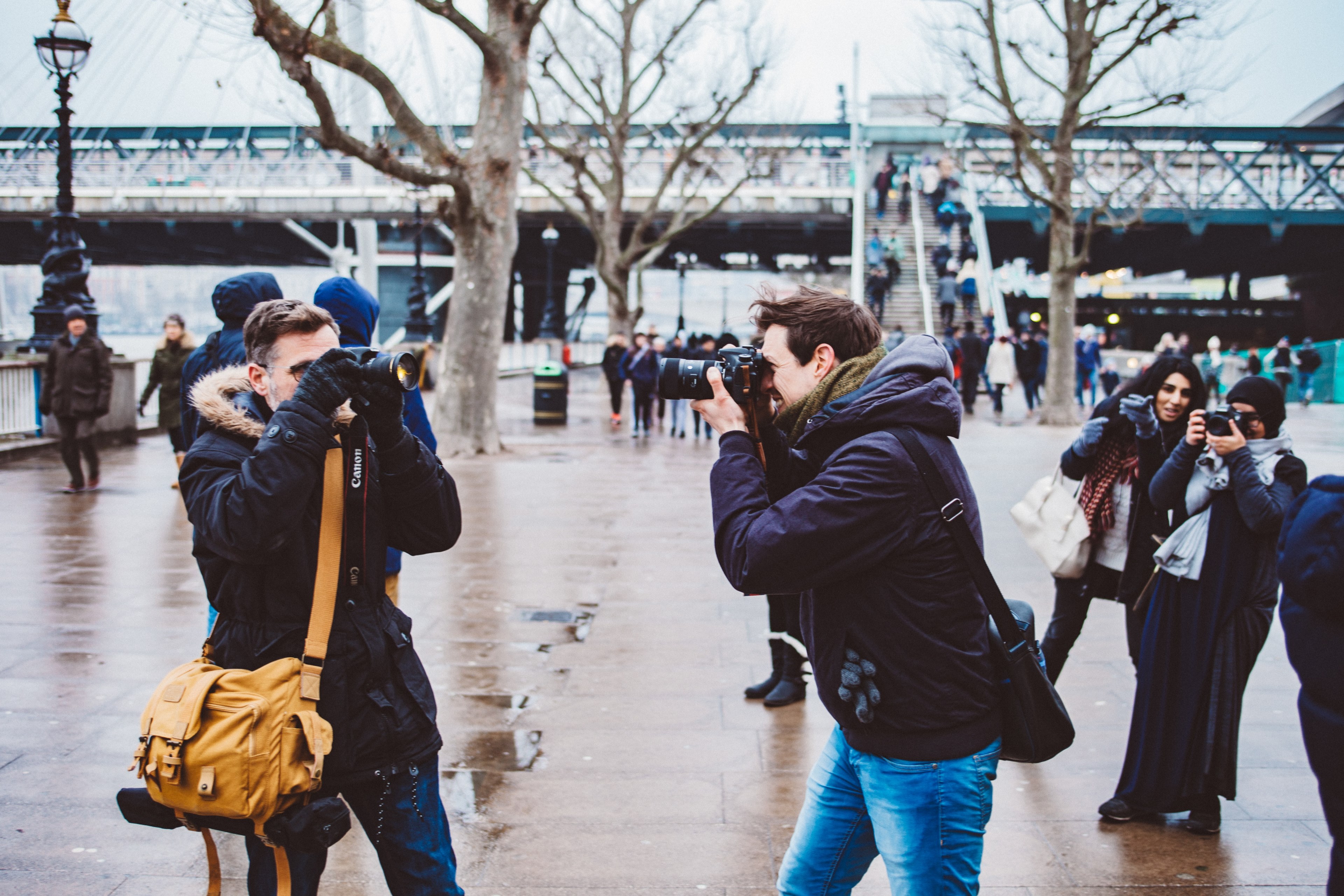 three photographers taking pictures of each other on a street in south bank, cameras at dawn 4k, HD Wallpaper