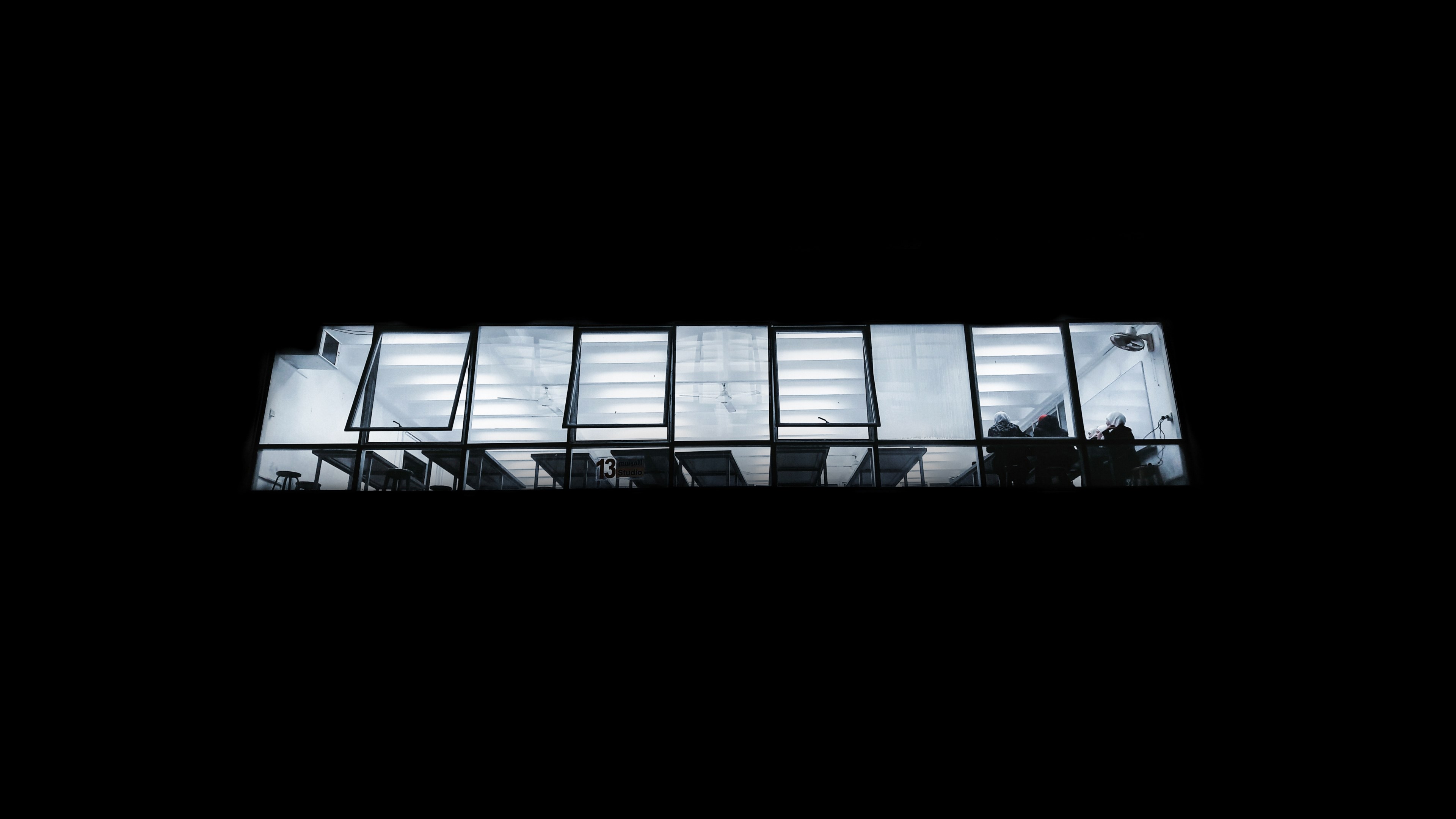 several people sitting at a canteen seen through a window from a dark street, studio 13 4k, HD Wallpaper