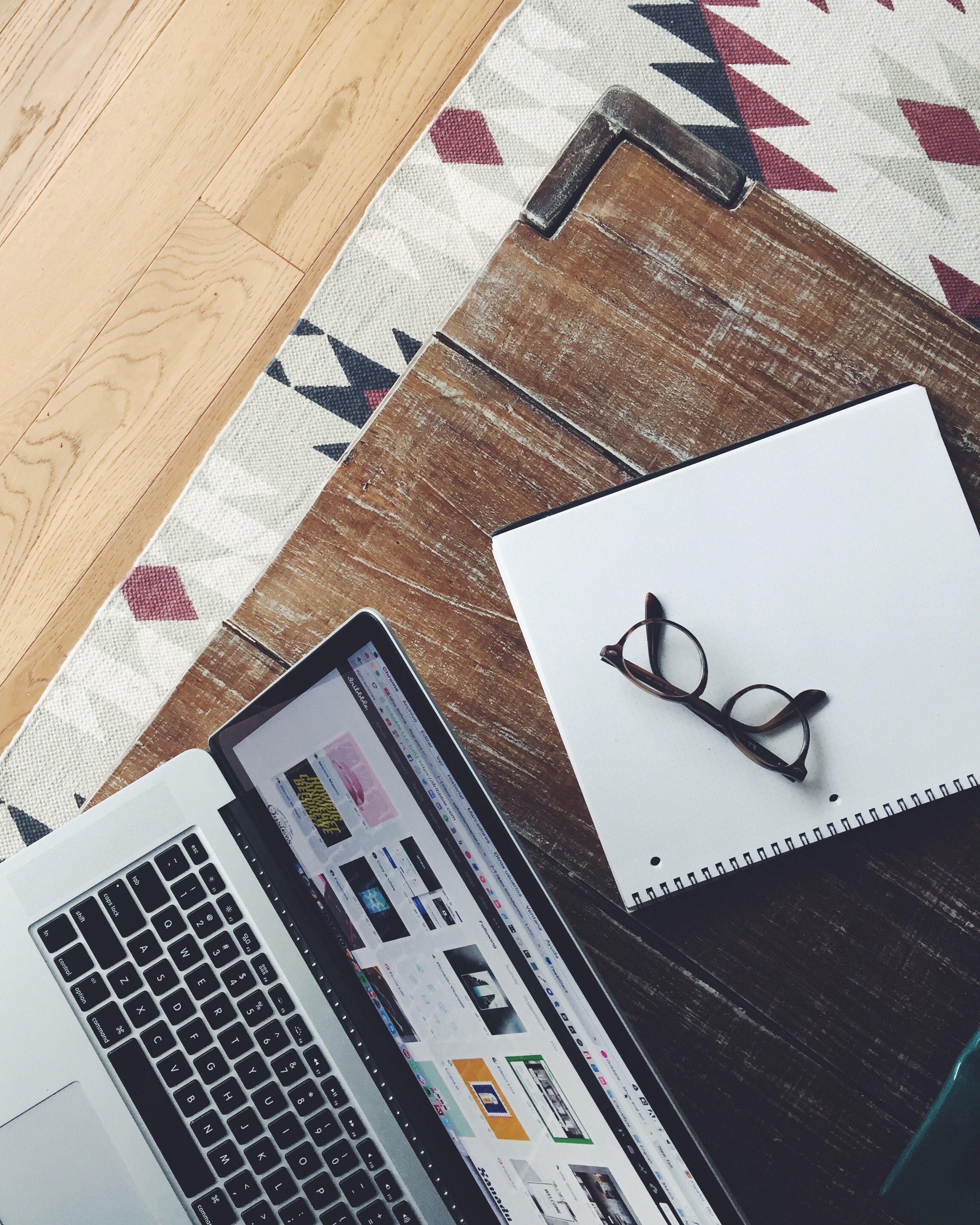 an overhead shot of a pair of glasses on a notebook next to a laptop, glasses and laptop from above 4k, Phone HD Wallpaper