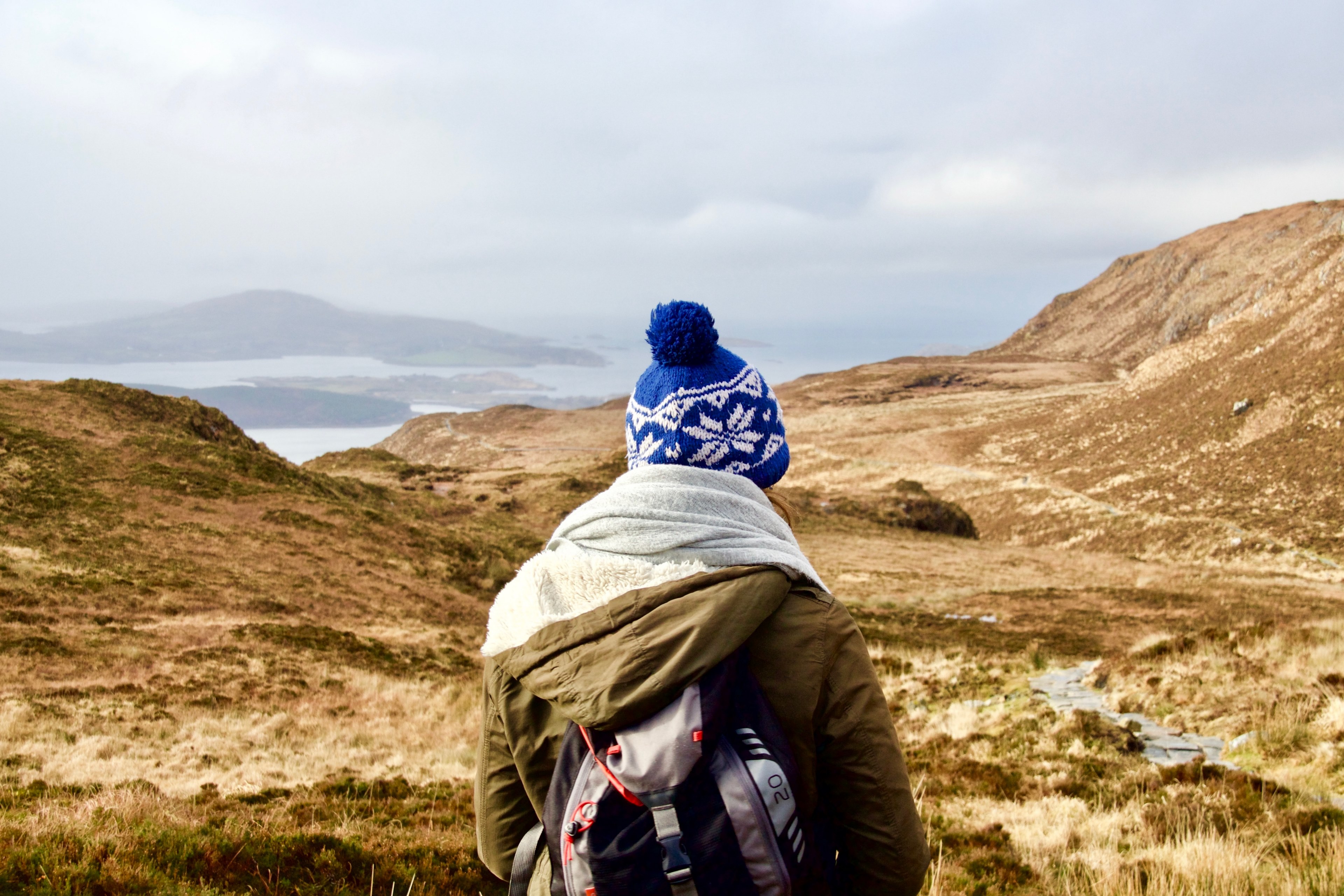 a man standing at diamond hill looking out at the large mountains, lost in the connemara diamond hill 4k, HD Wallpaper