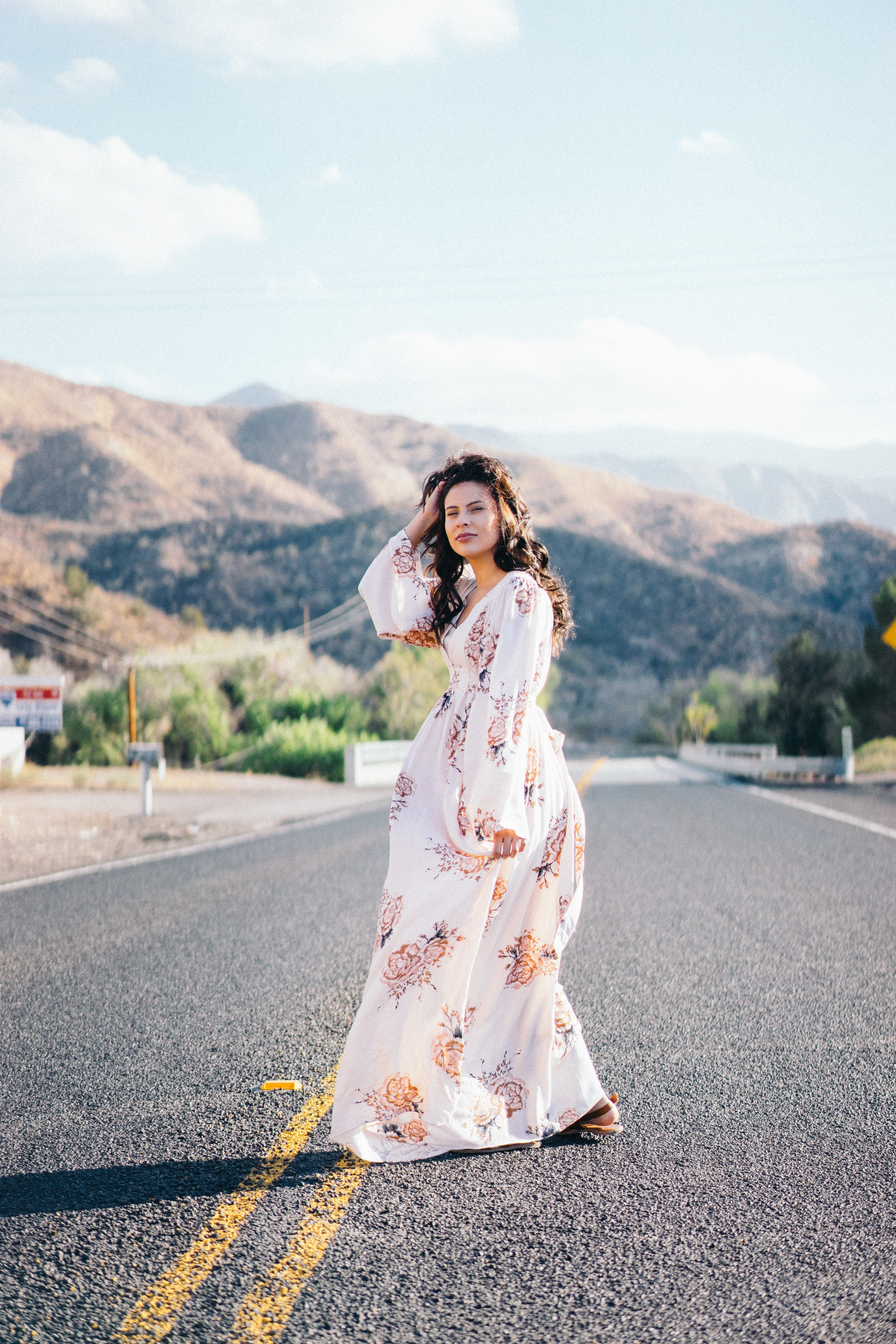 a woman wearing a long flowing white dress walking down the street in los angeles, los angeles woman in white 4k, Phone HD Wallpaper