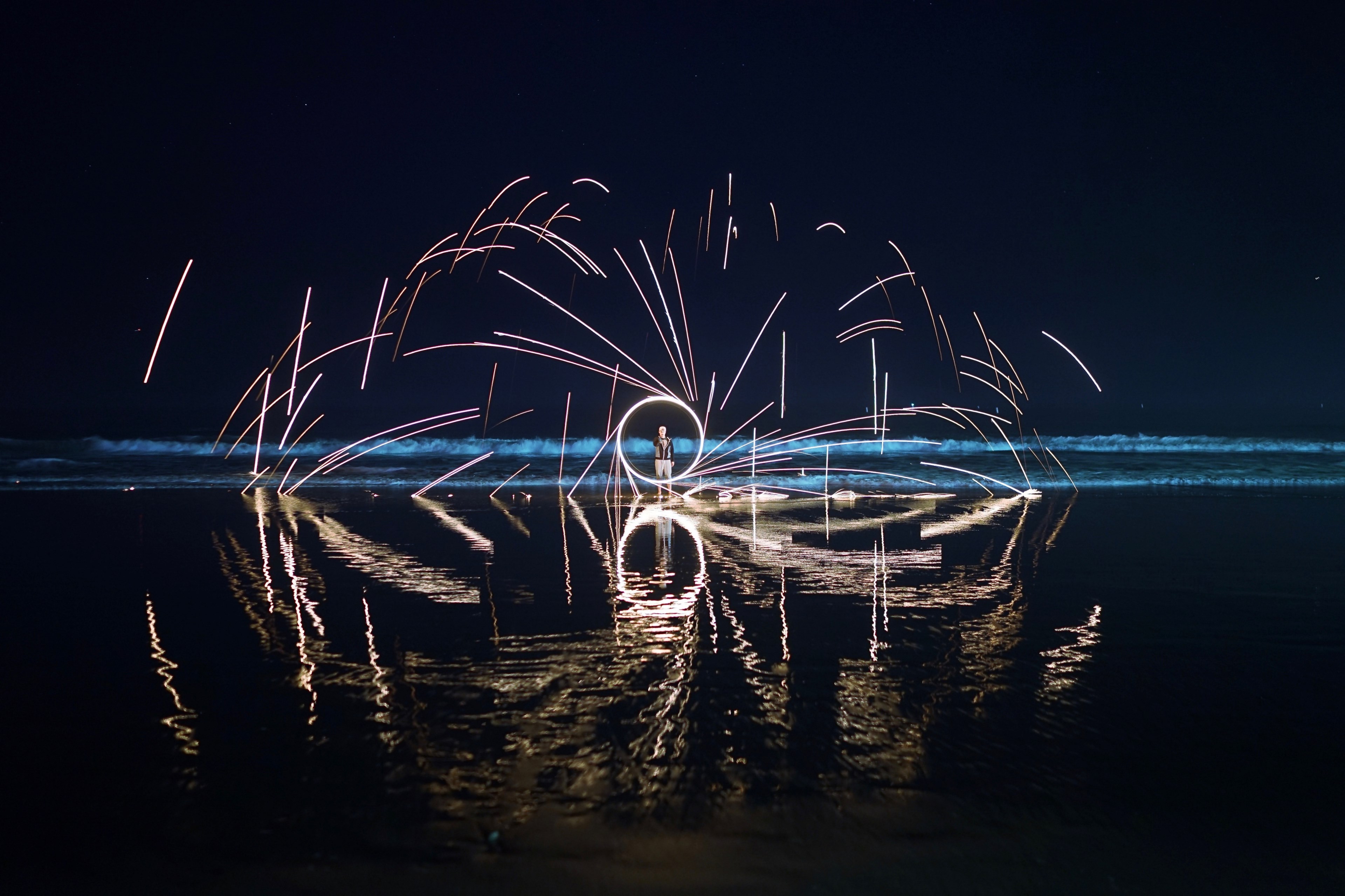 a long exposure shot with circular light trails on a santa monica waterfront, night light trails in santa monica 4k, HD Wallpaper