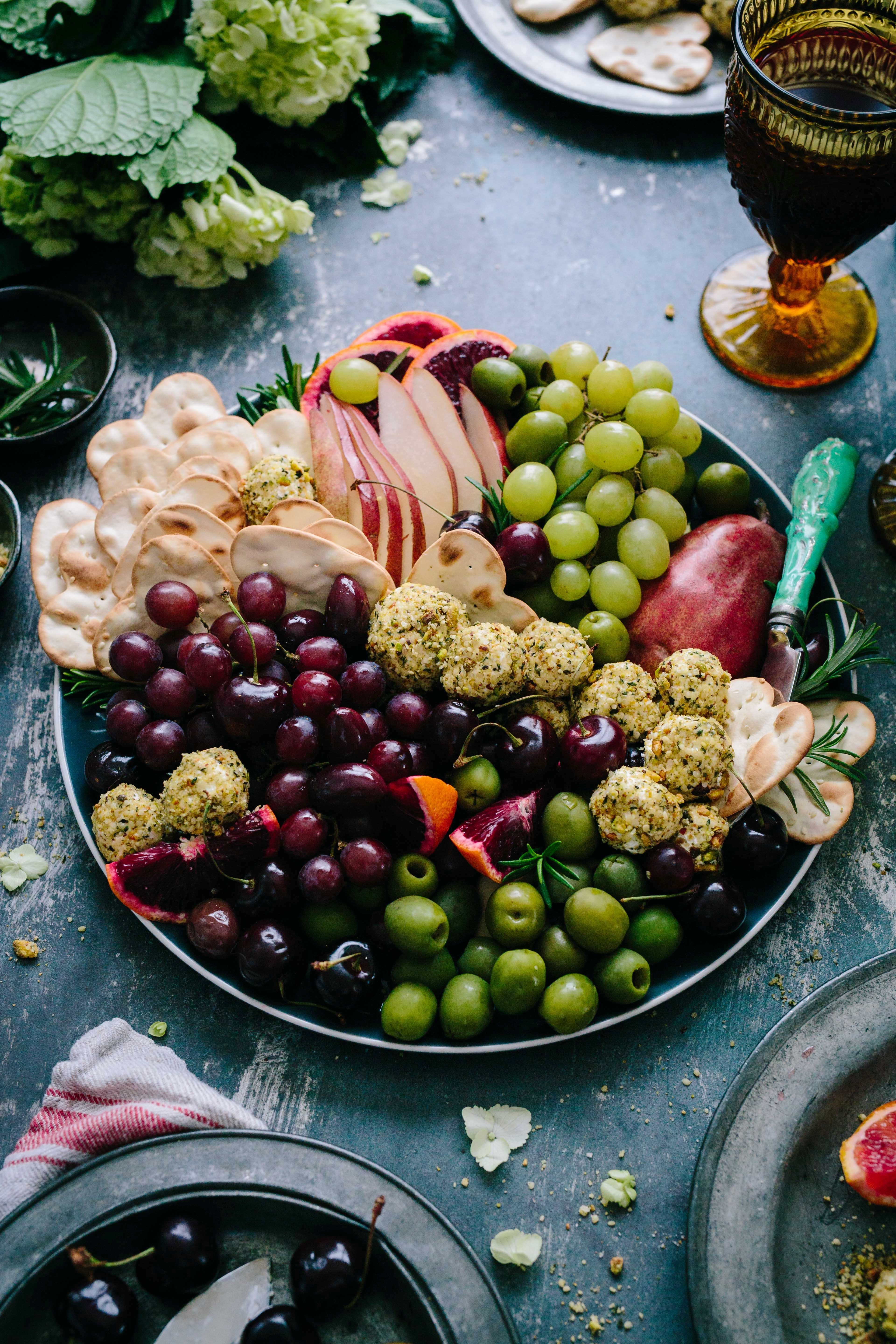 a large plate of grapes and olives, _winter fruit platter 4k, Phone HD Wallpaper