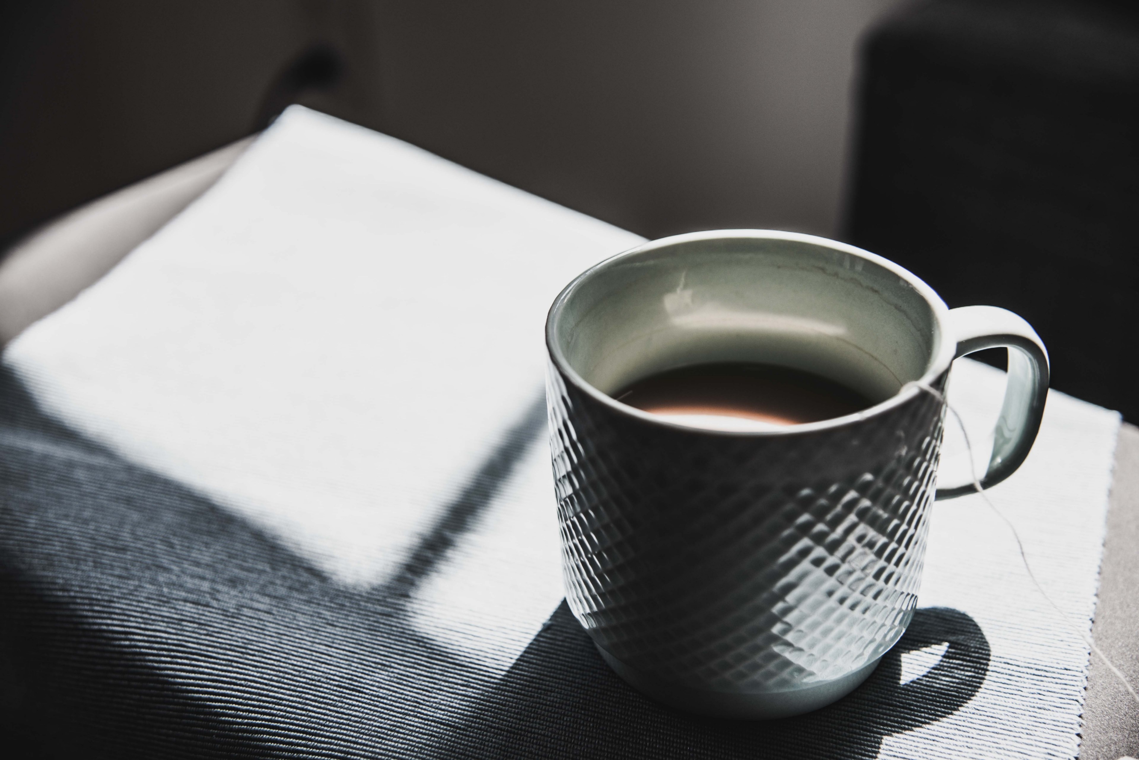 a cup of tea in a white ceramic mug on a tablecloth in the sun with a shadow, morning tea 4k, HD Wallpaper