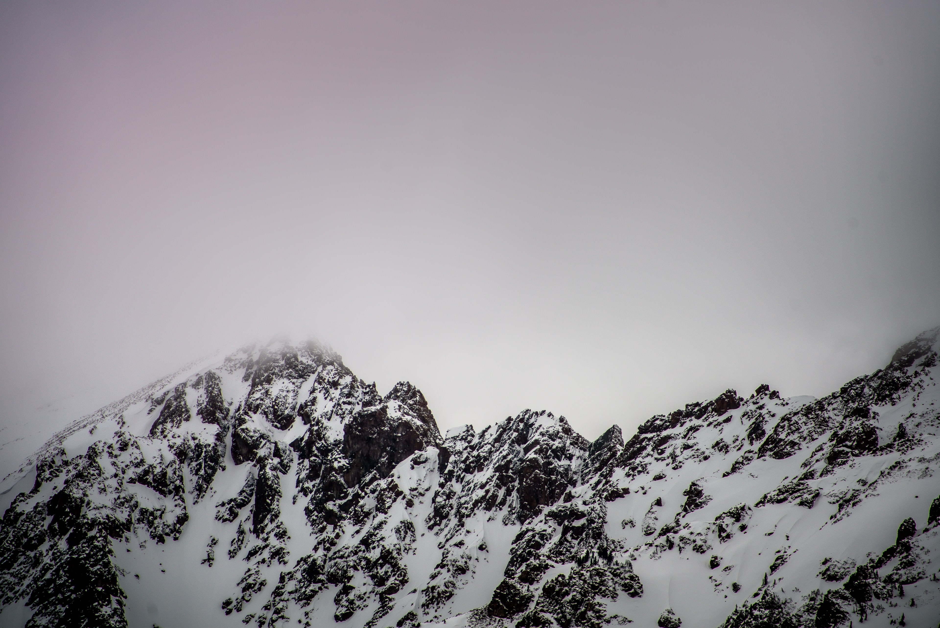 purple fog over snowcapped mountain peaks in red mountain, fog over jagged mountains 4k, HD Wallpaper