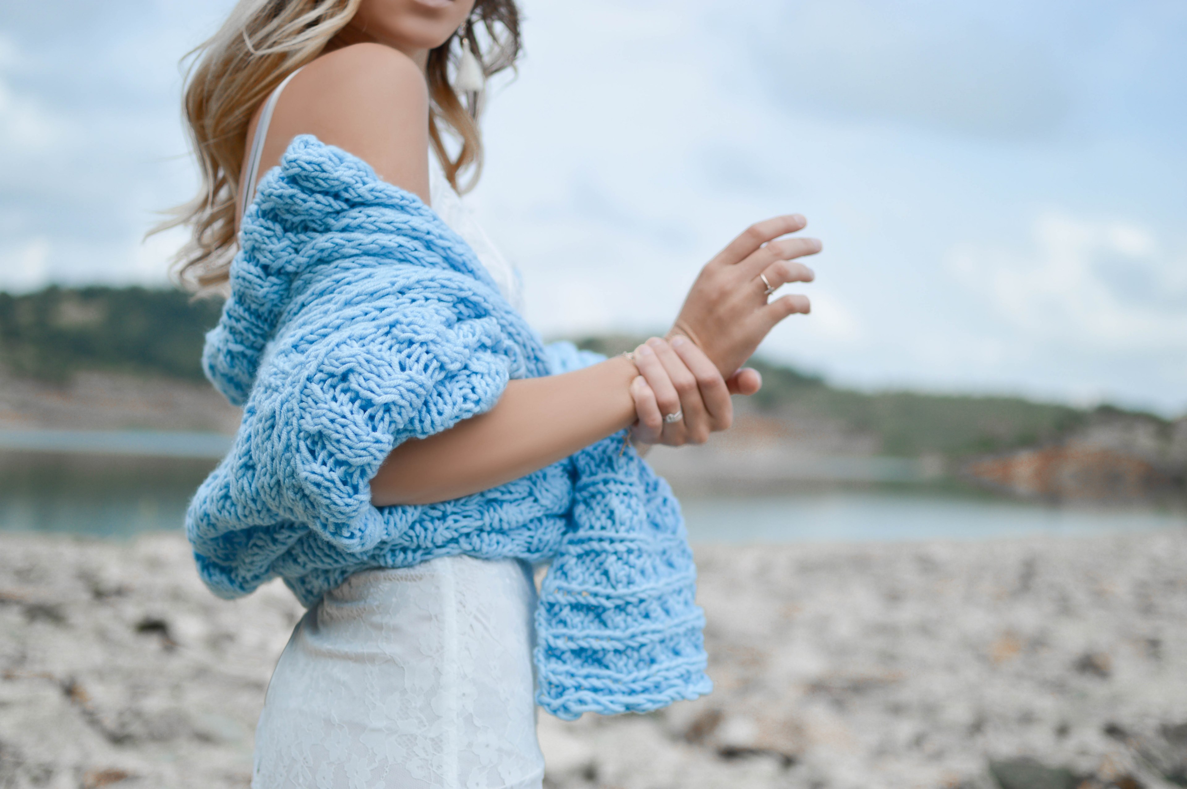 a young woman with a blue knit scarf standing on a beach, woman with a blue scarf 4k, HD Wallpaper