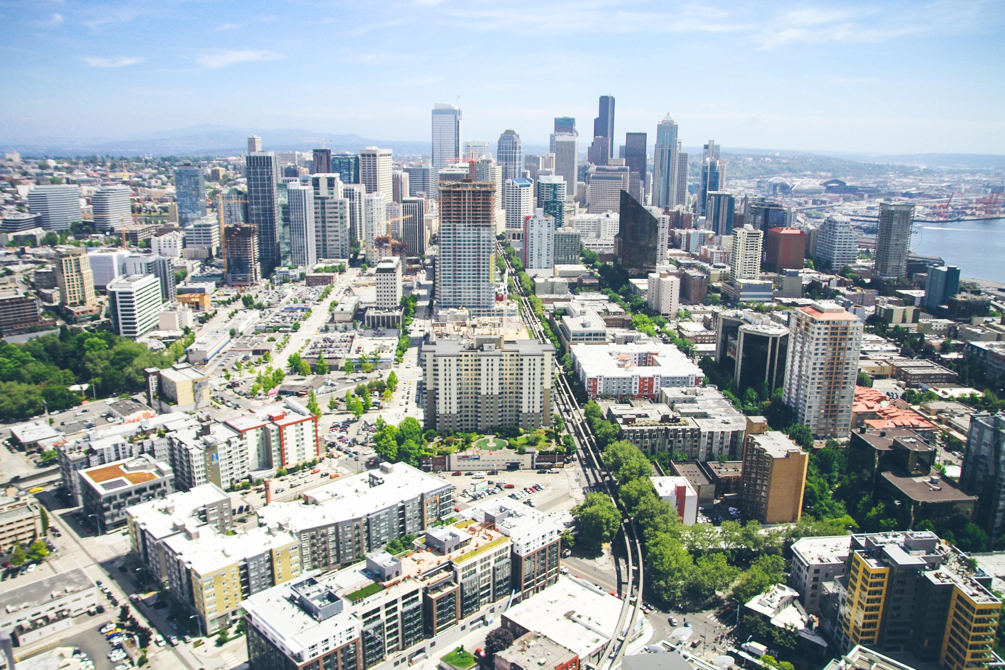 a high view of a city skyline with high rises and residential buildings, urban landscape 4k, HD Wallpaper