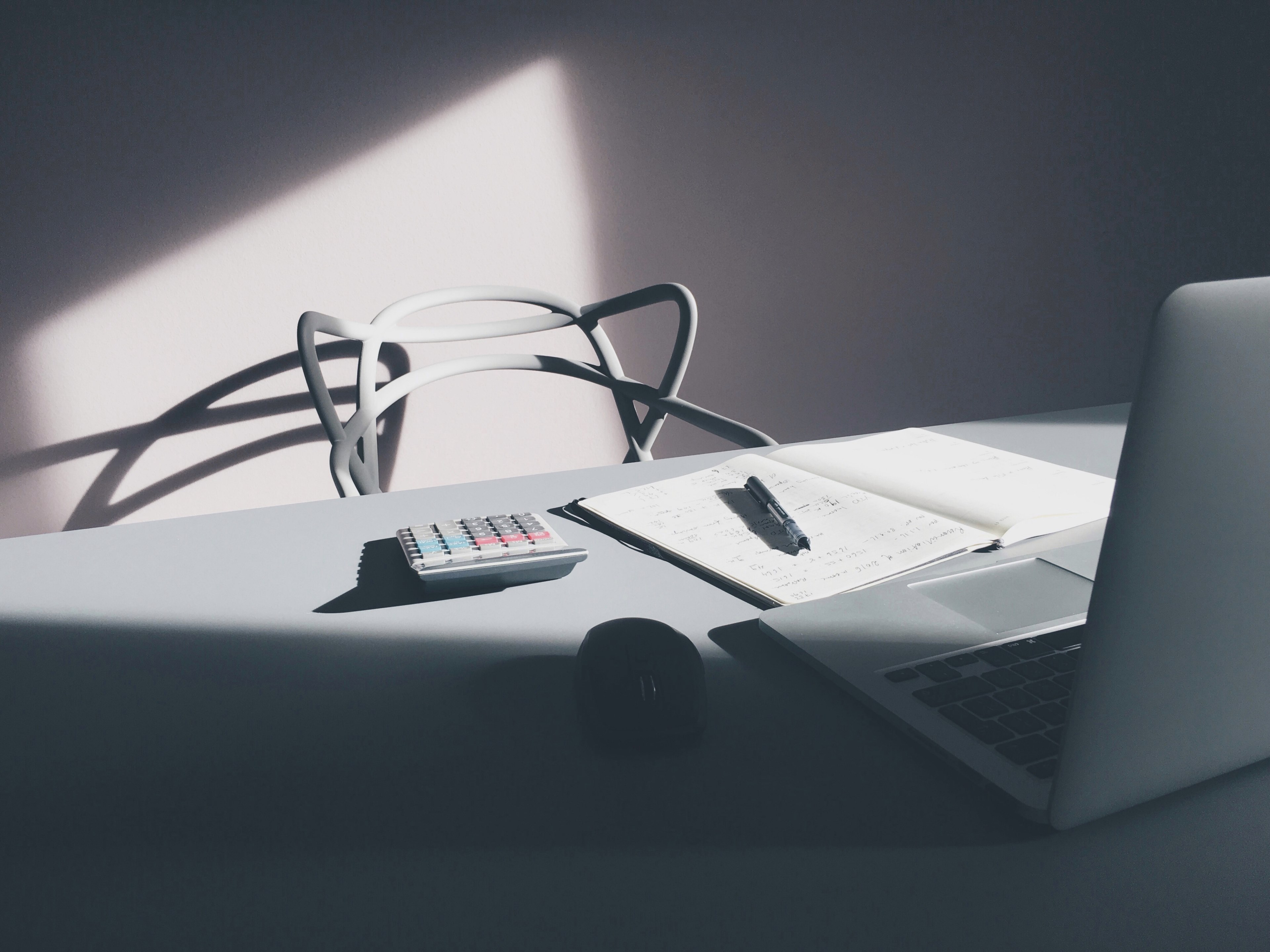 a modern white chair at a table with a laptop a notebook and a calculator, accountant home desk 4k, HD Wallpaper