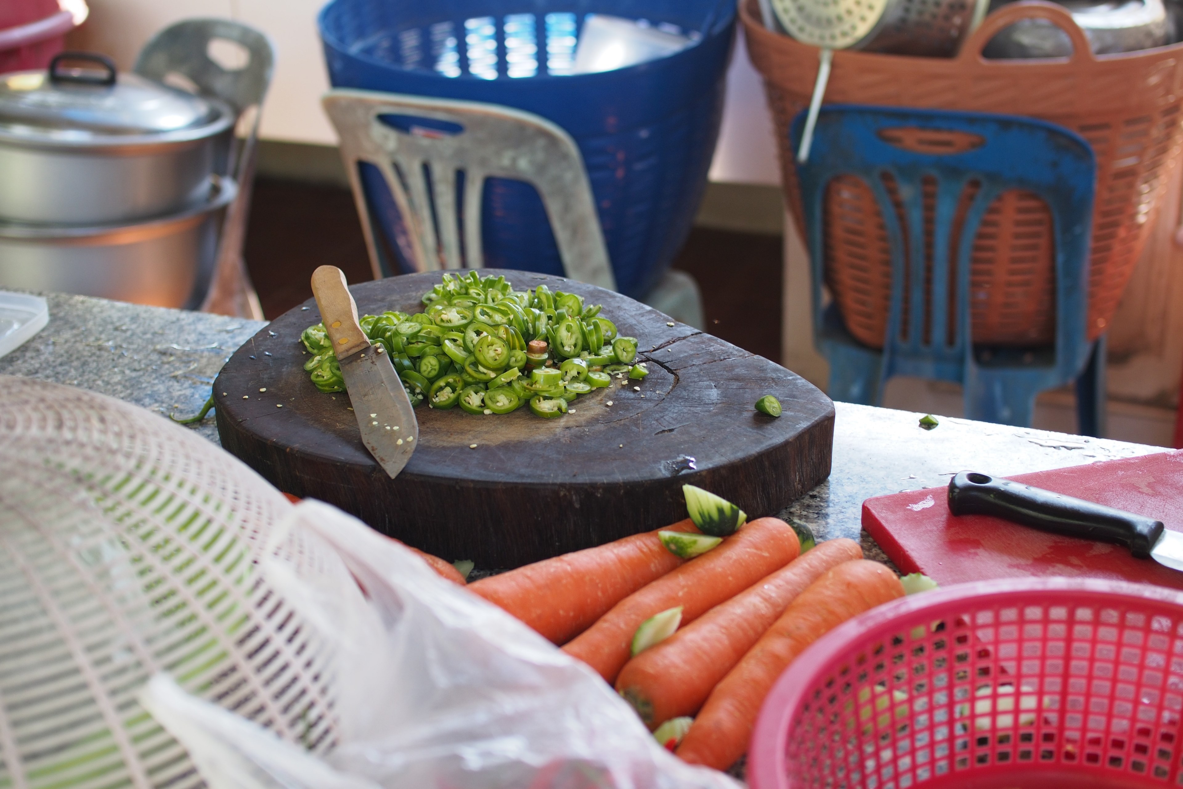 chopped jalapeno peppers and carrots on a kitchen table, preparing ingredients 4k, HD Wallpaper