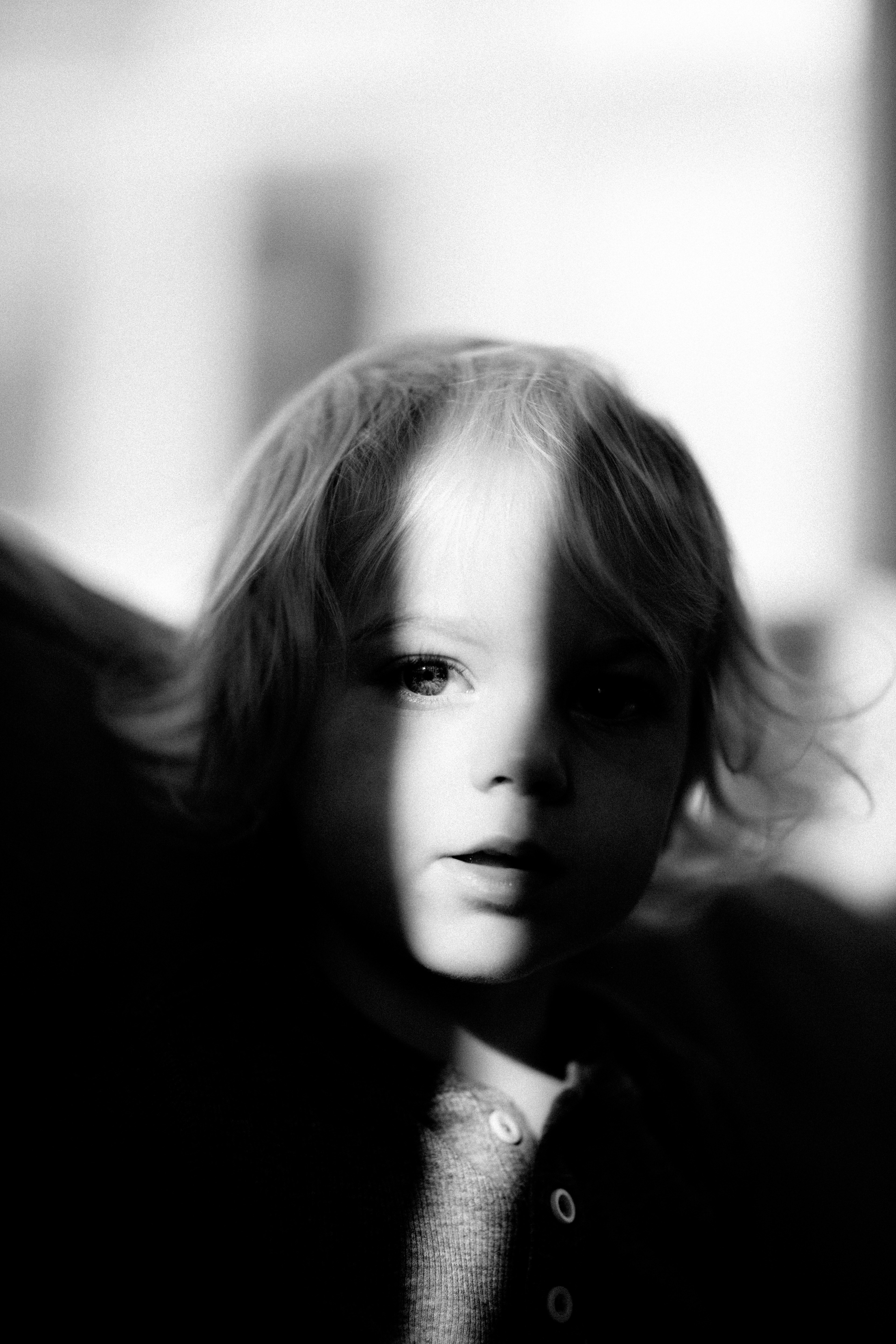 black and white shot of young child with light and shadow on face castlecrag, monochrome child castlecrag 4k, Phone HD Wallpaper