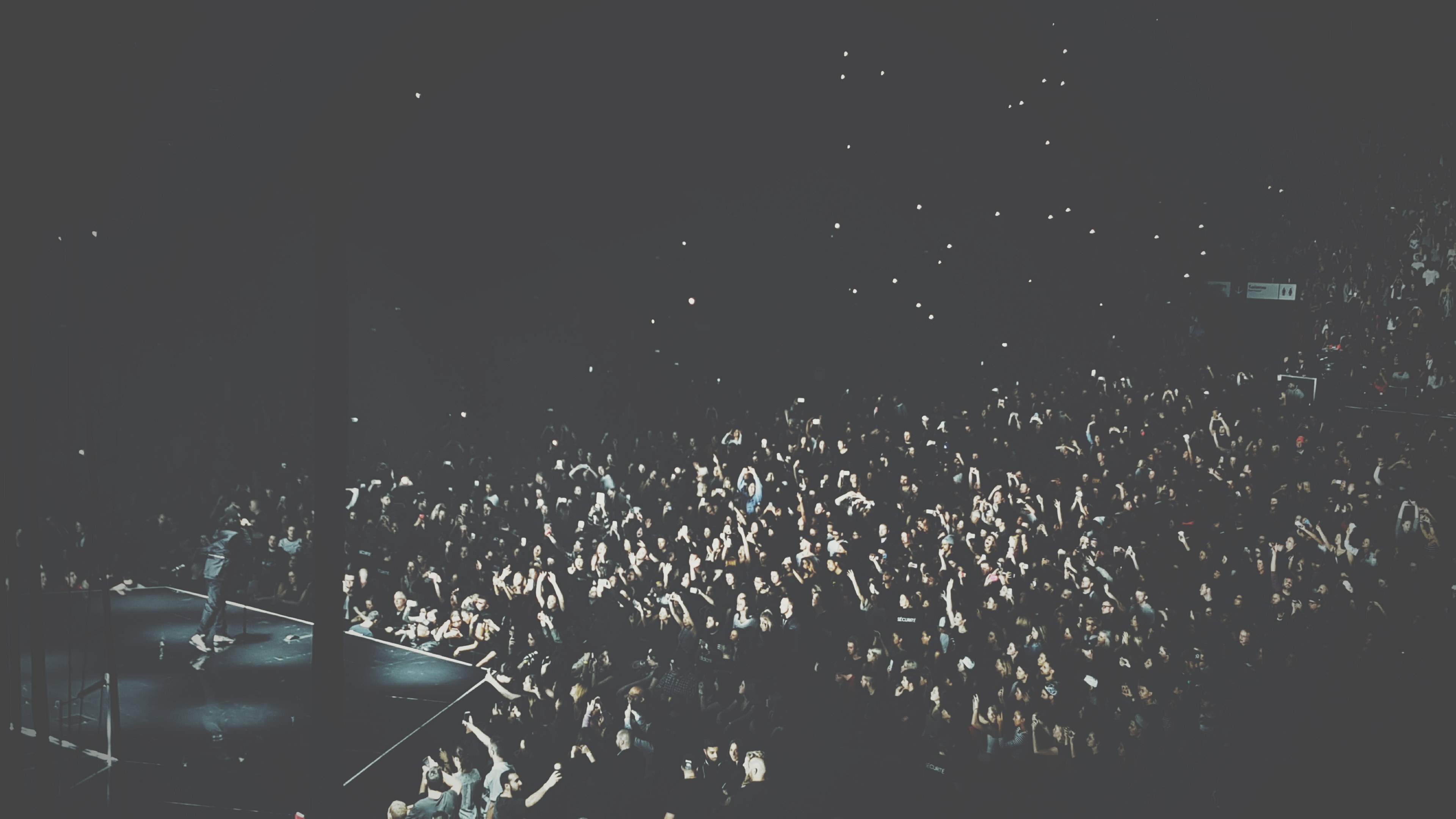 a high shot of a large crowd of people filling up a venue during a concert, sold out concert in montreal 4k, HD Wallpaper